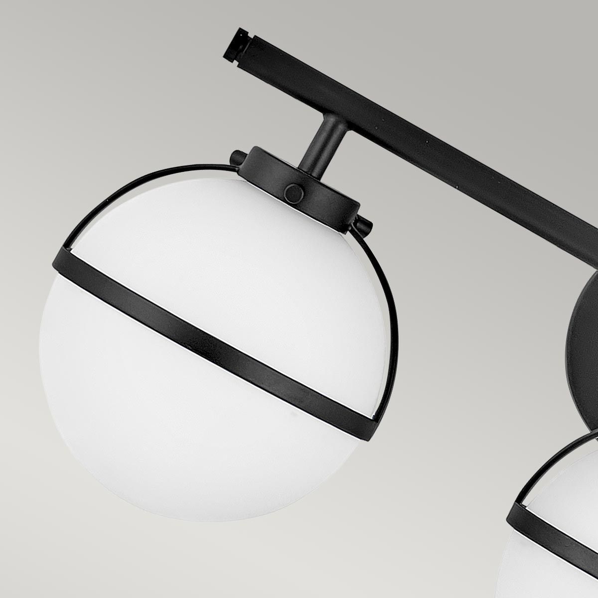 Front view of the three-head Hollis Wall Lamp in black.