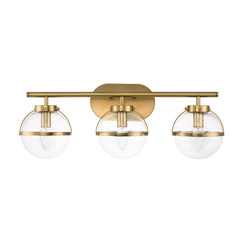 Hollis Wall Lamp with two heads, brass finish, turned on.