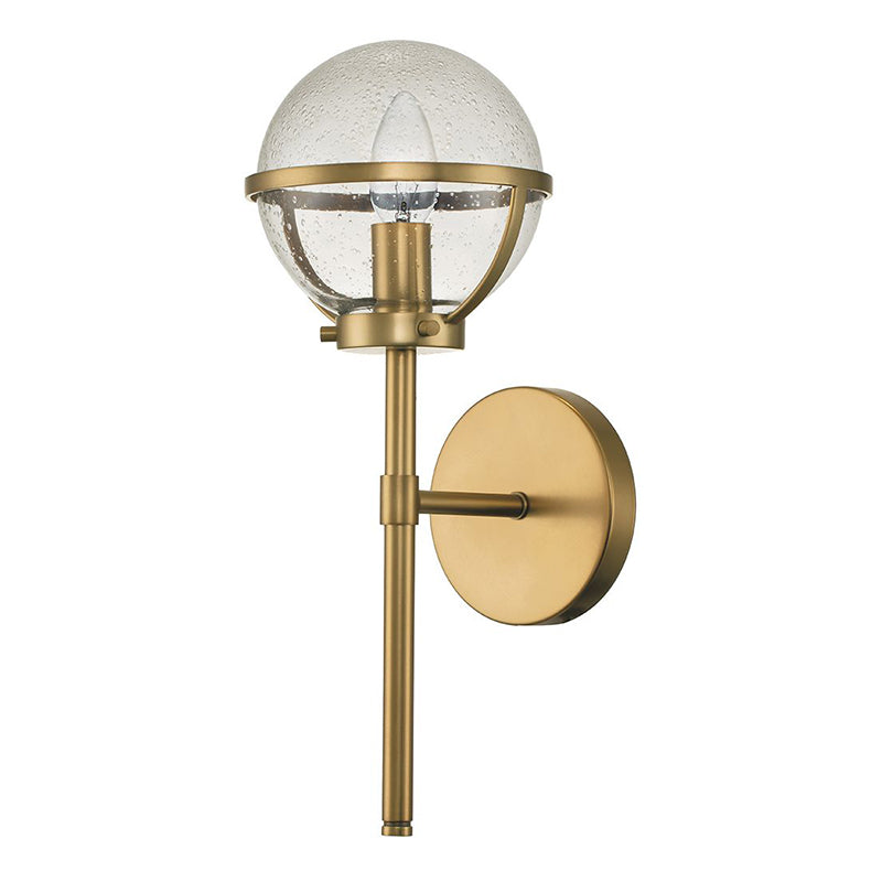 Hollis Wall Sconce displayed against a dark wall for dramatic contrast.