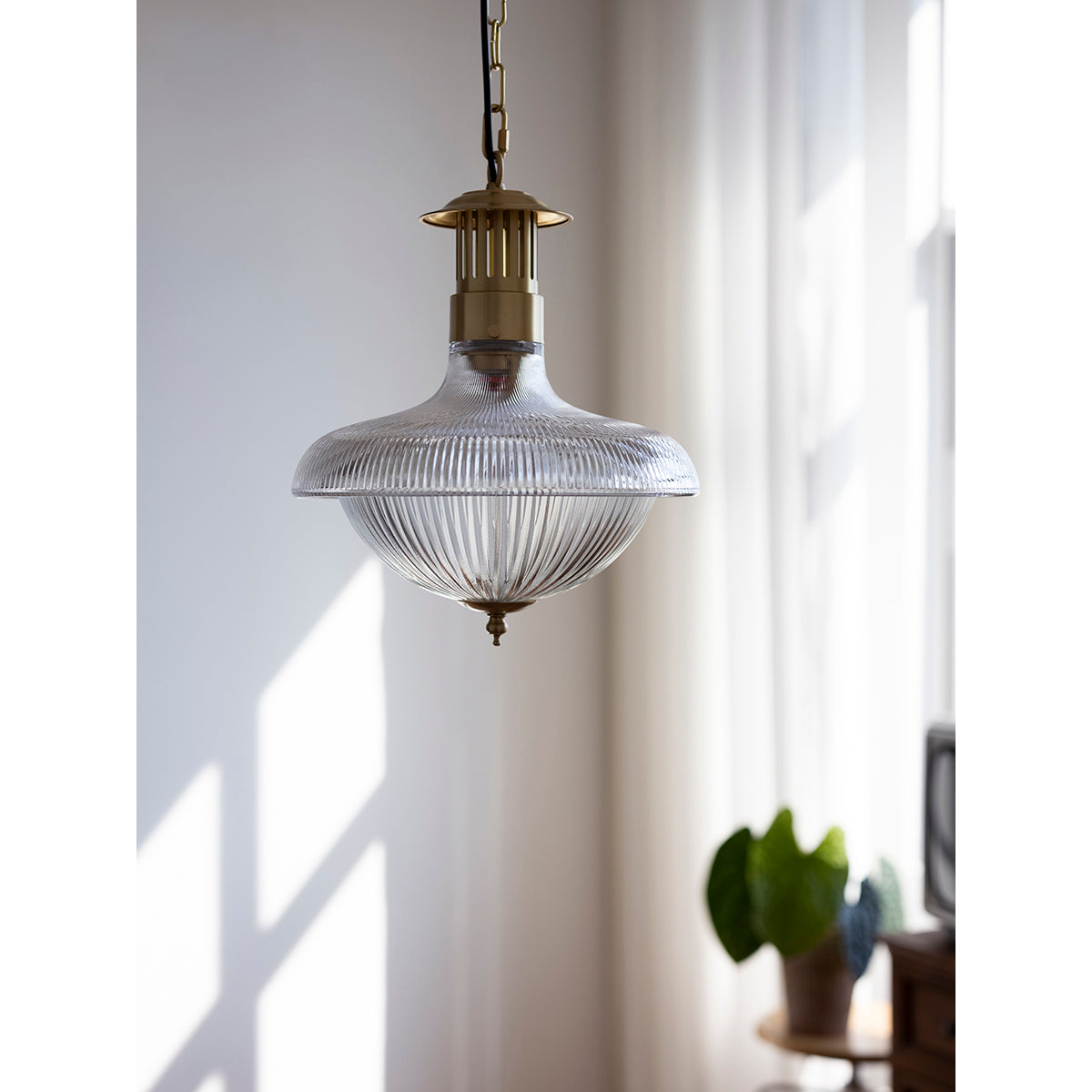 The lamp shown with a vintage-style Edison bulb (not included).