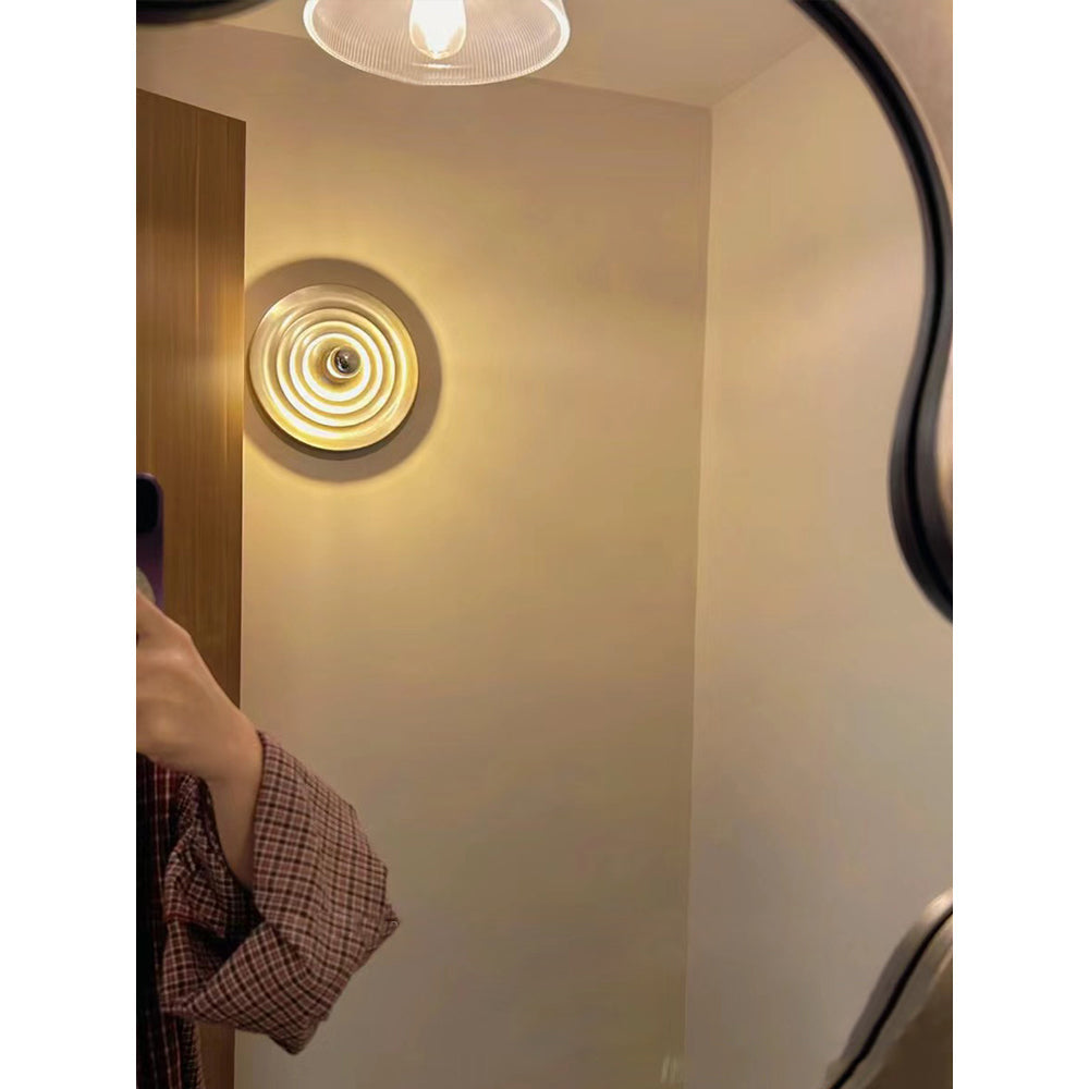 The Honsel Leuchten wall lamp in a home office setting.