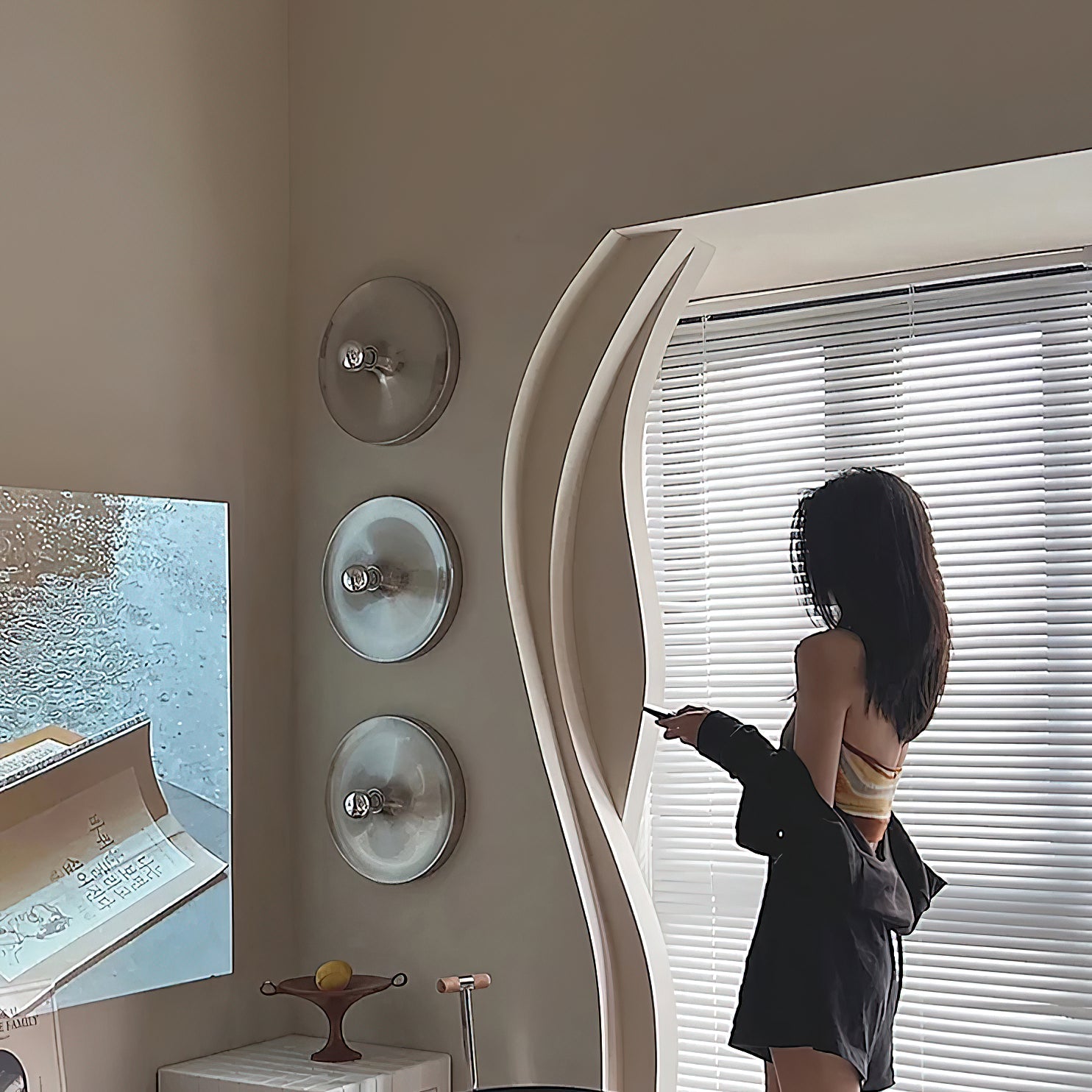 Lifestyle view of the lamp mounted above a minimalist console table.