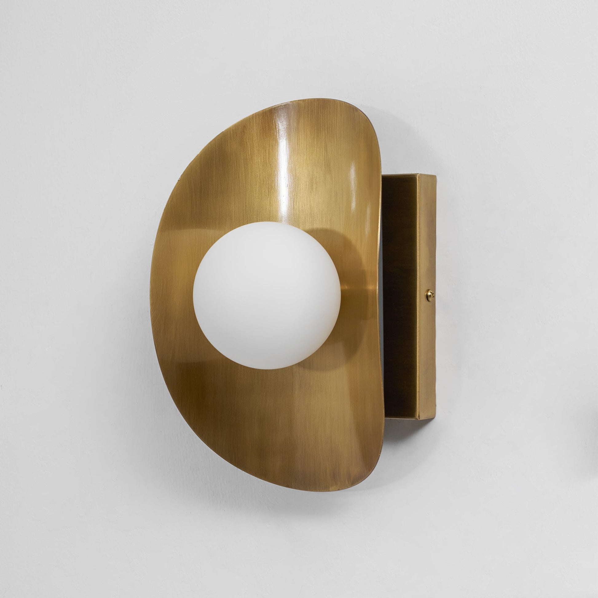 Hopper Wall Lamp in a minimalist interior design.