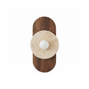 Horizon Travertine Wall Sconce against a neutral wall.