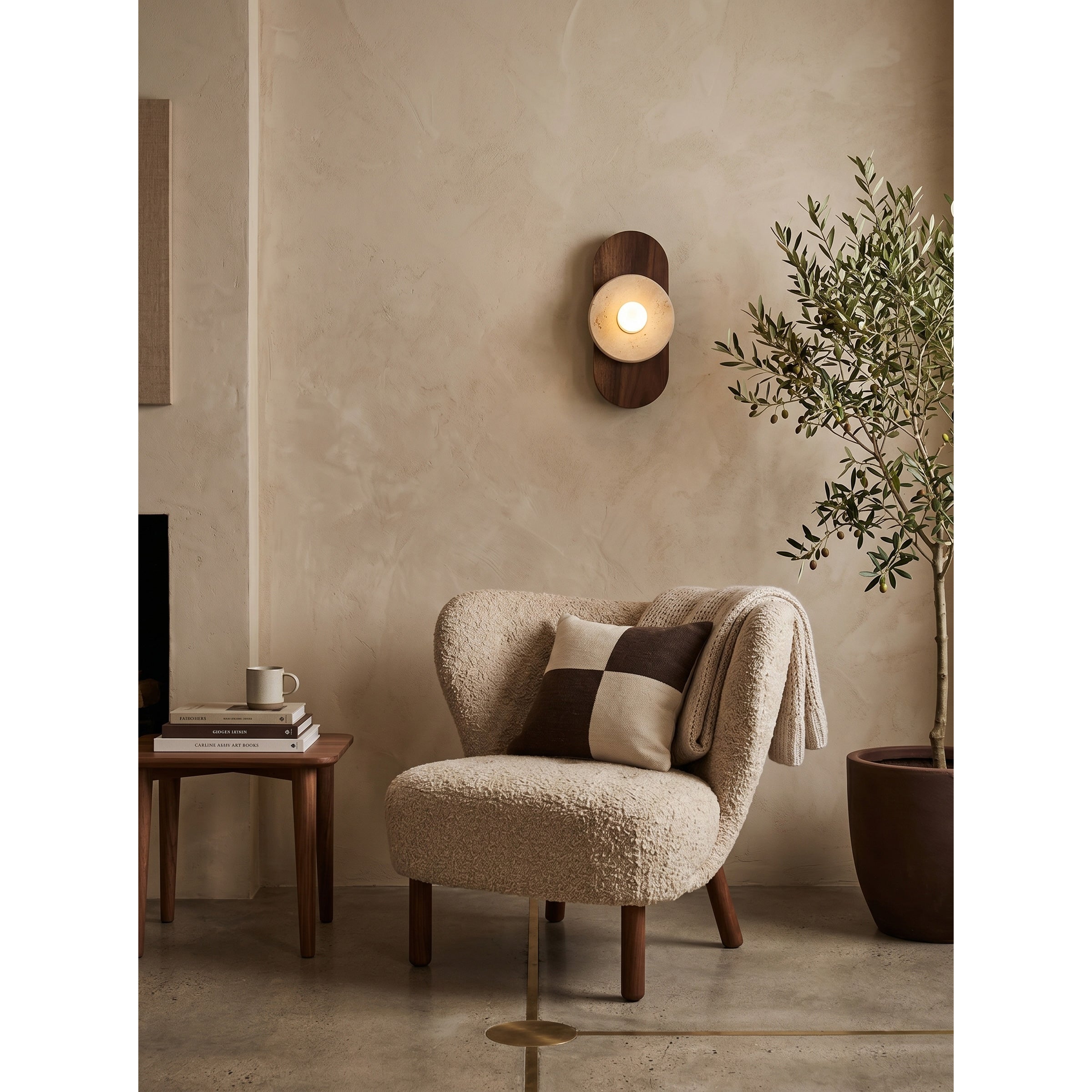 Unlit view of the sconce showcasing the texture of the travertine and wood.