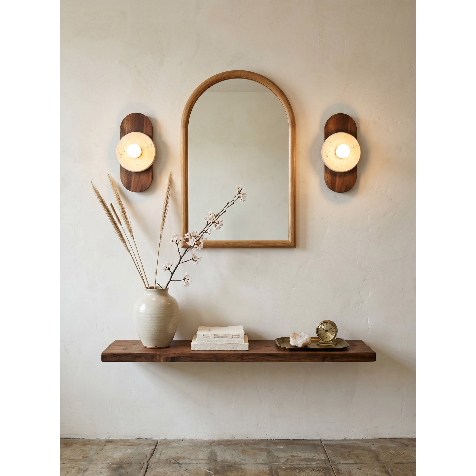 Side profile of the wall sconce highlighting its stacked design.