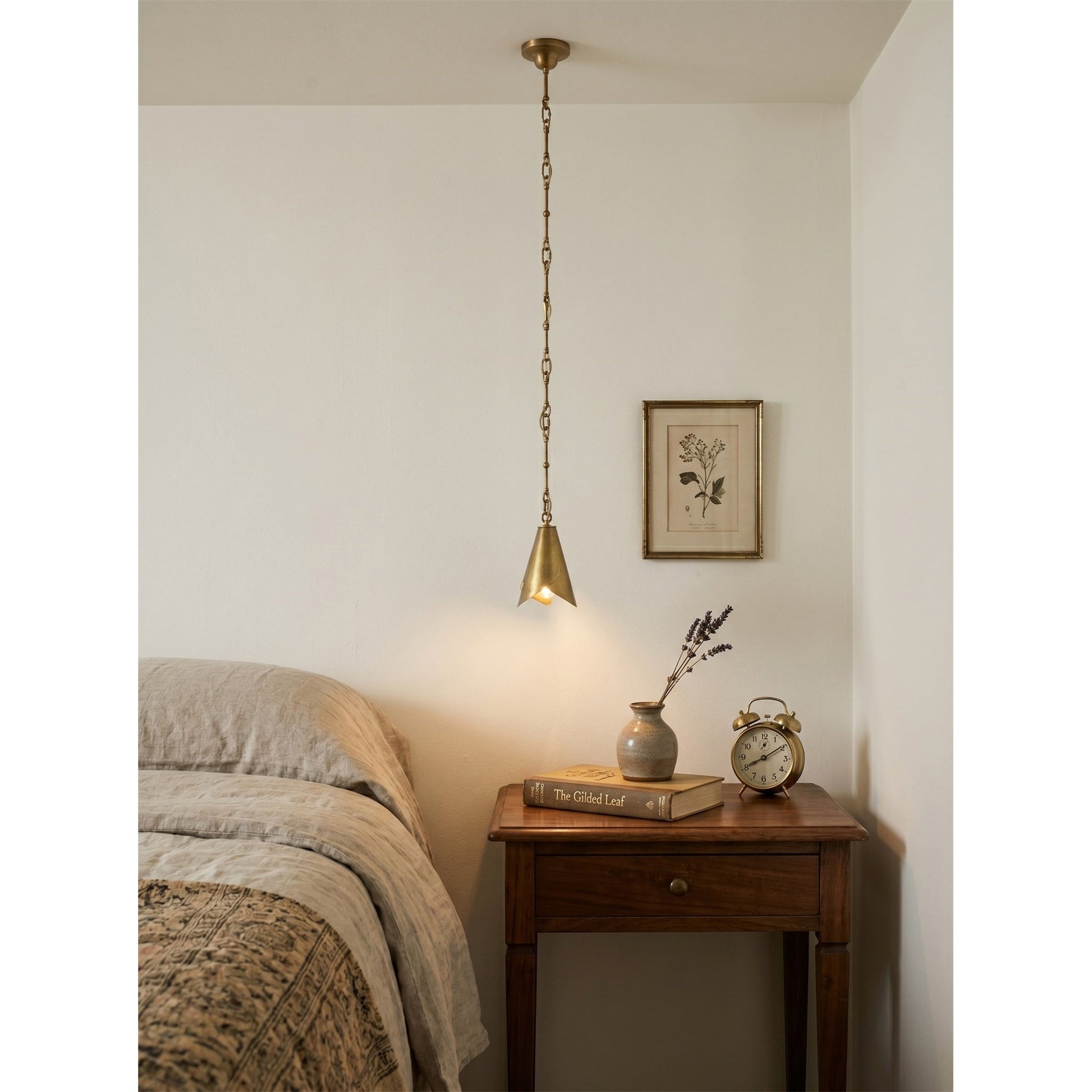 Side view of the equestrian-inspired pendant lamp.