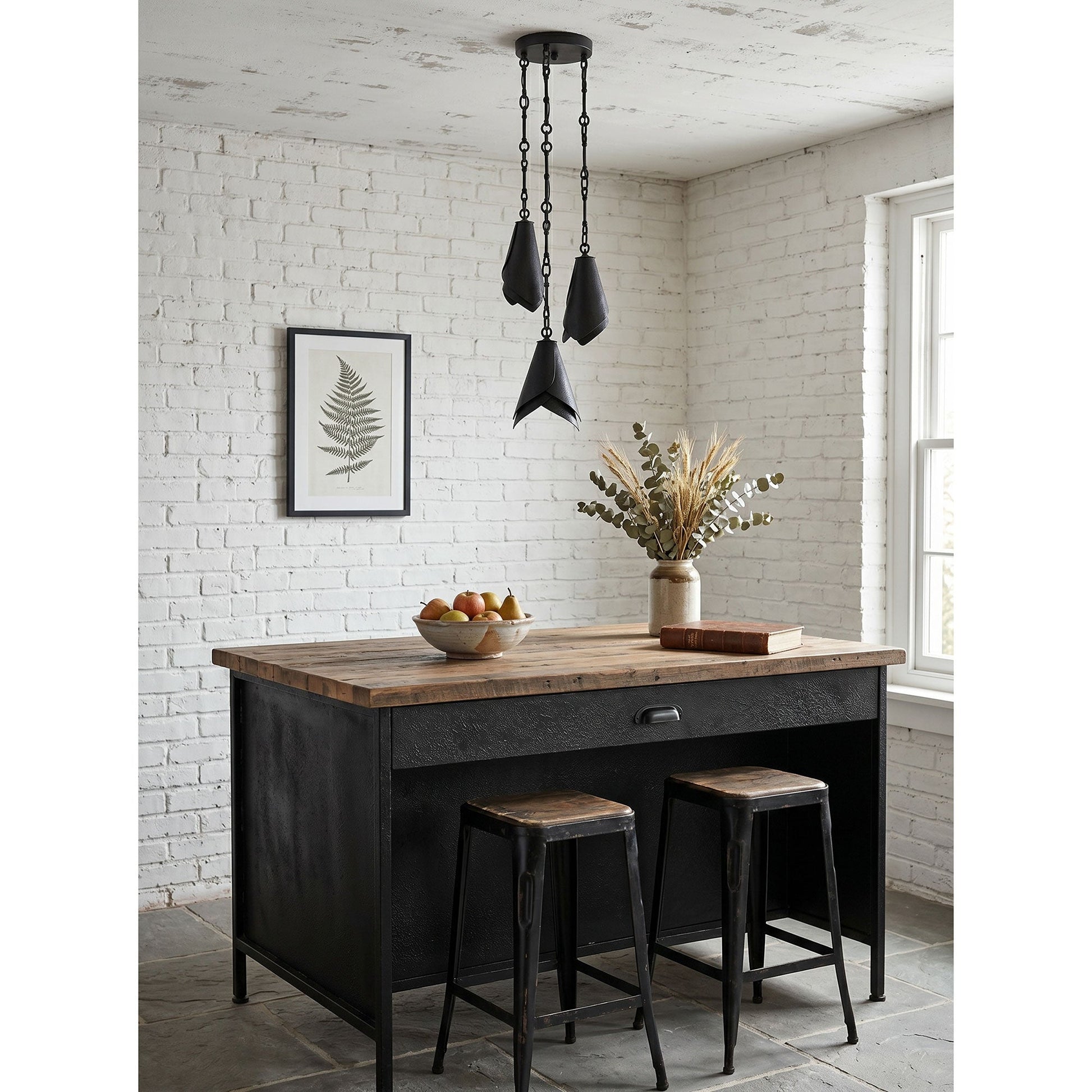 The Horse Hoof lamp illuminating a kitchen island.