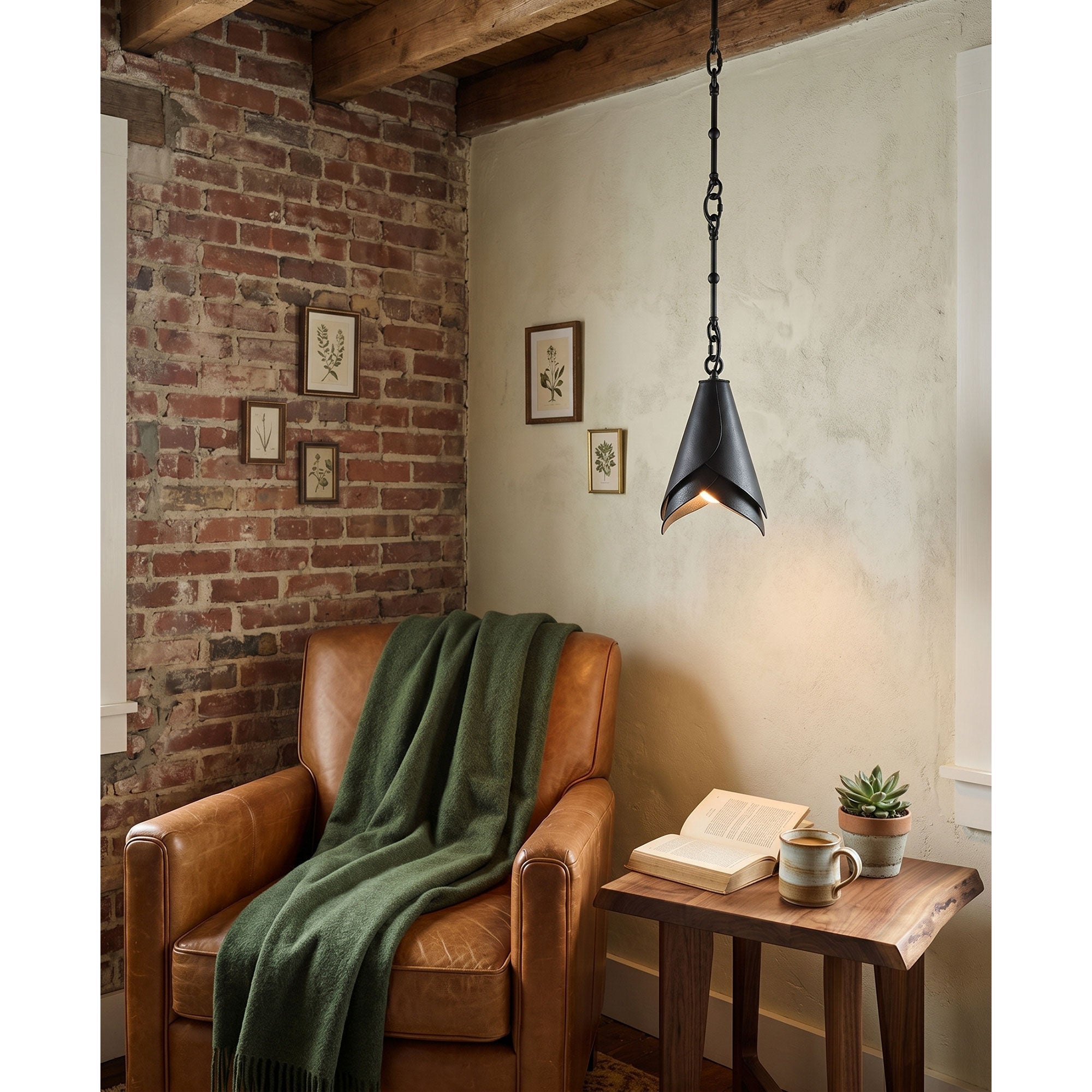 The pendant lamp shown lit to display its warm glow.