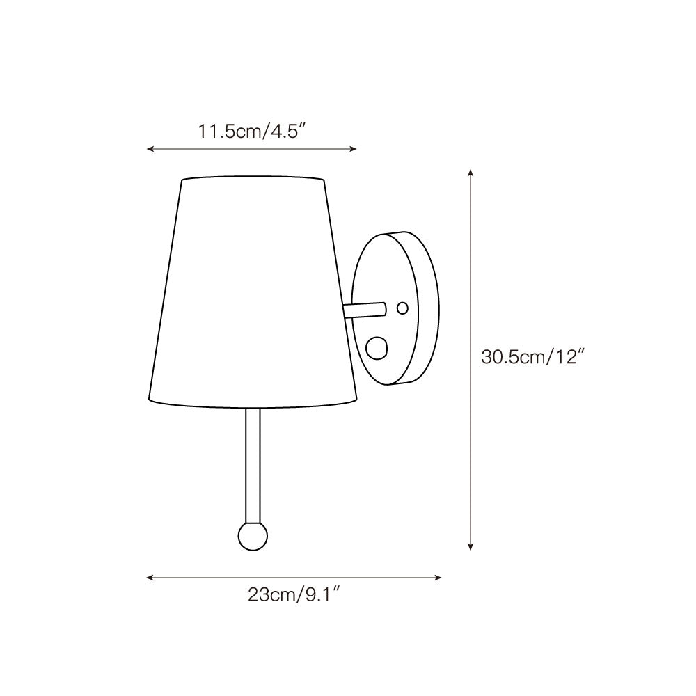 The House Wall Lamp installed in a modern living room, casting a warm light.