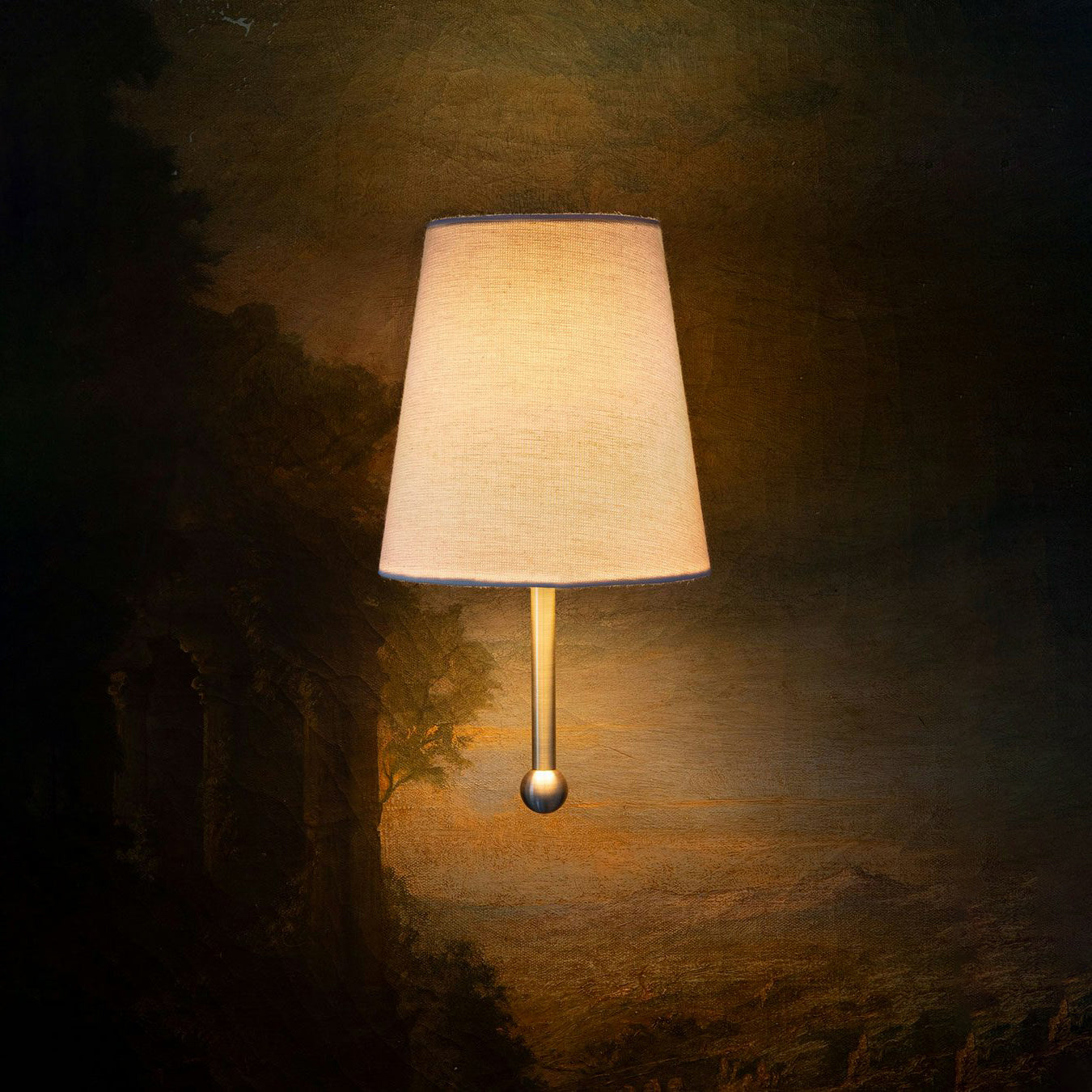 The House Wall Lamp shown in a bedroom setting, providing ambient light.