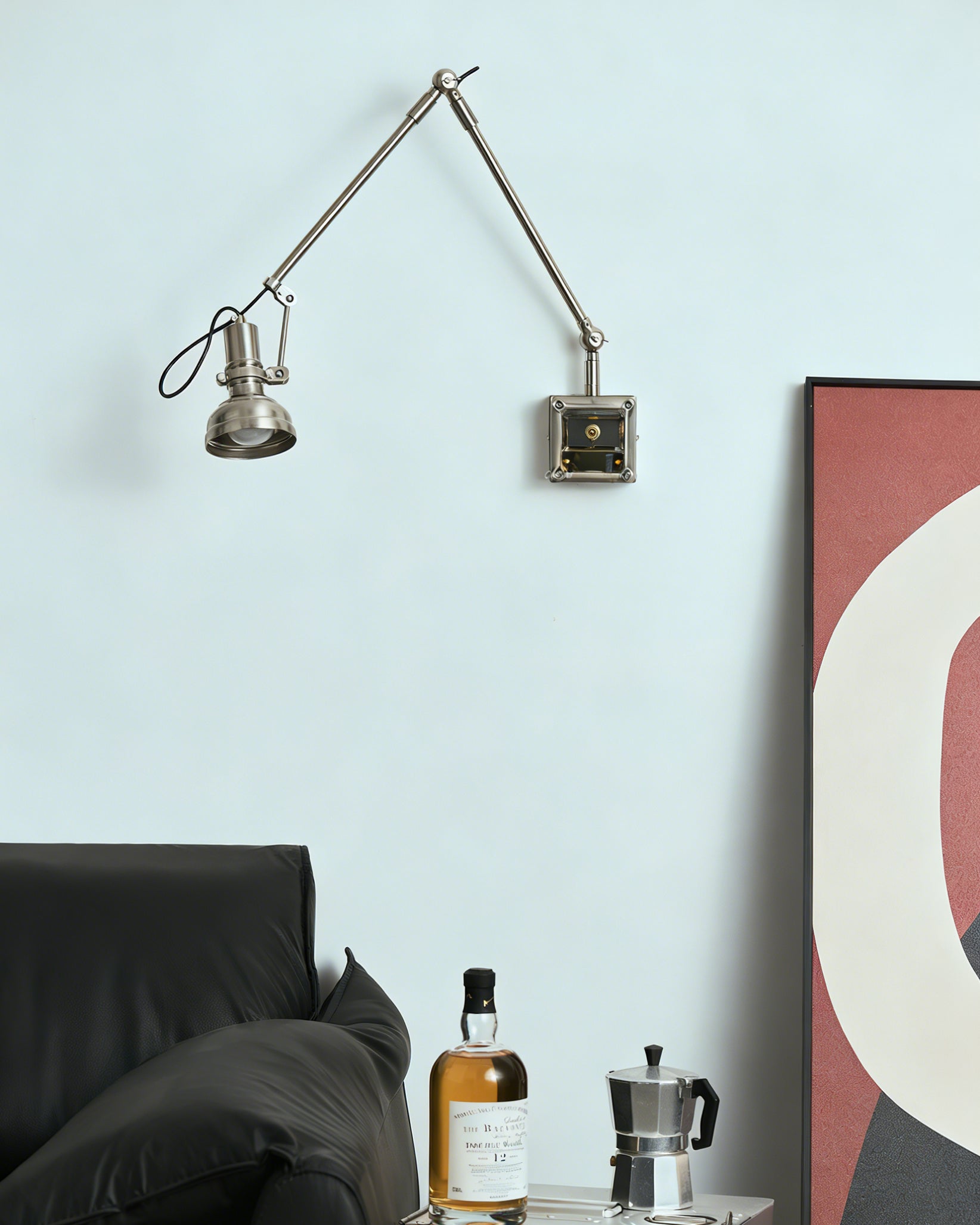Lifestyle image of the sconce in an industrial-style office