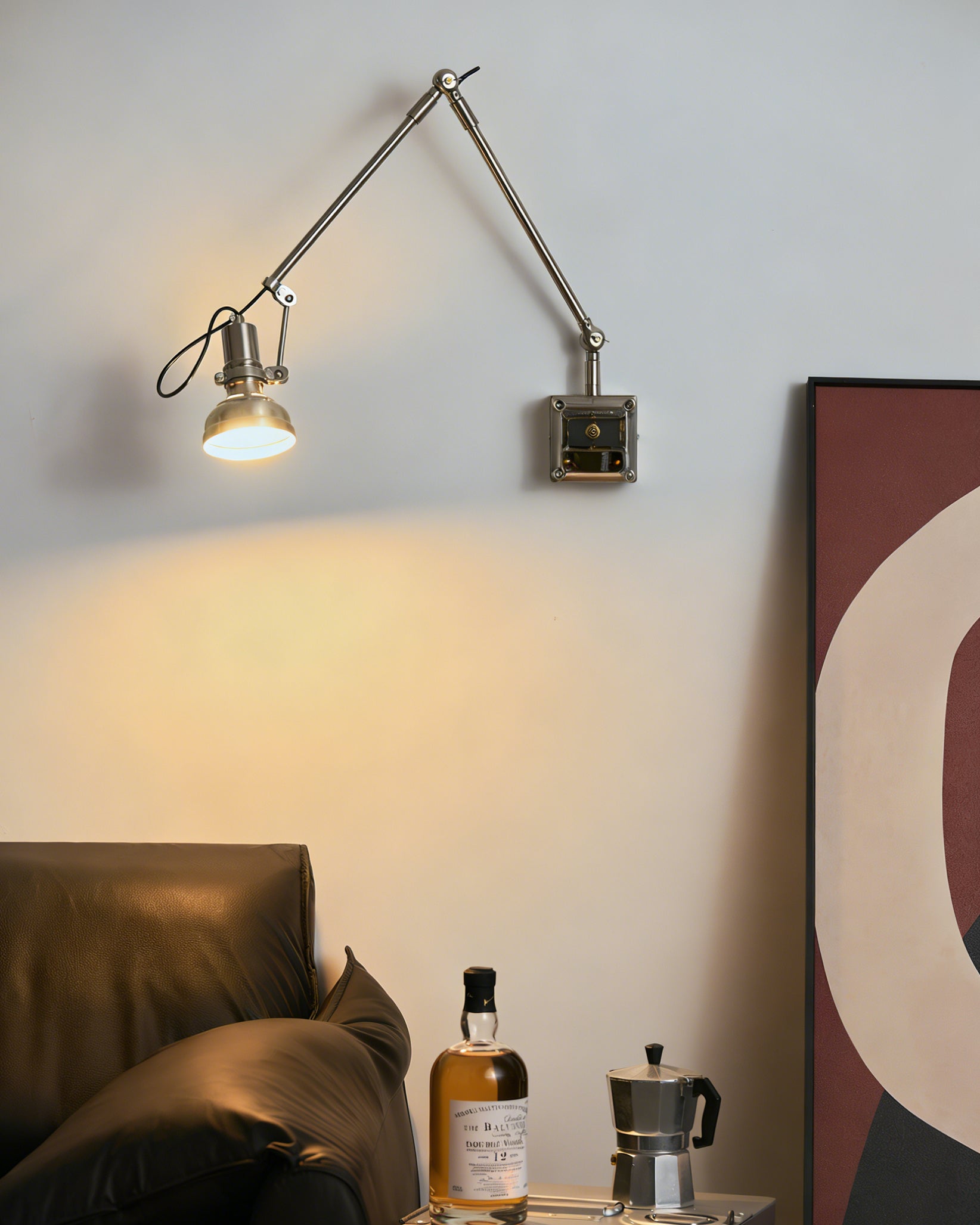 The Hudson sconce extended over a modern workstation