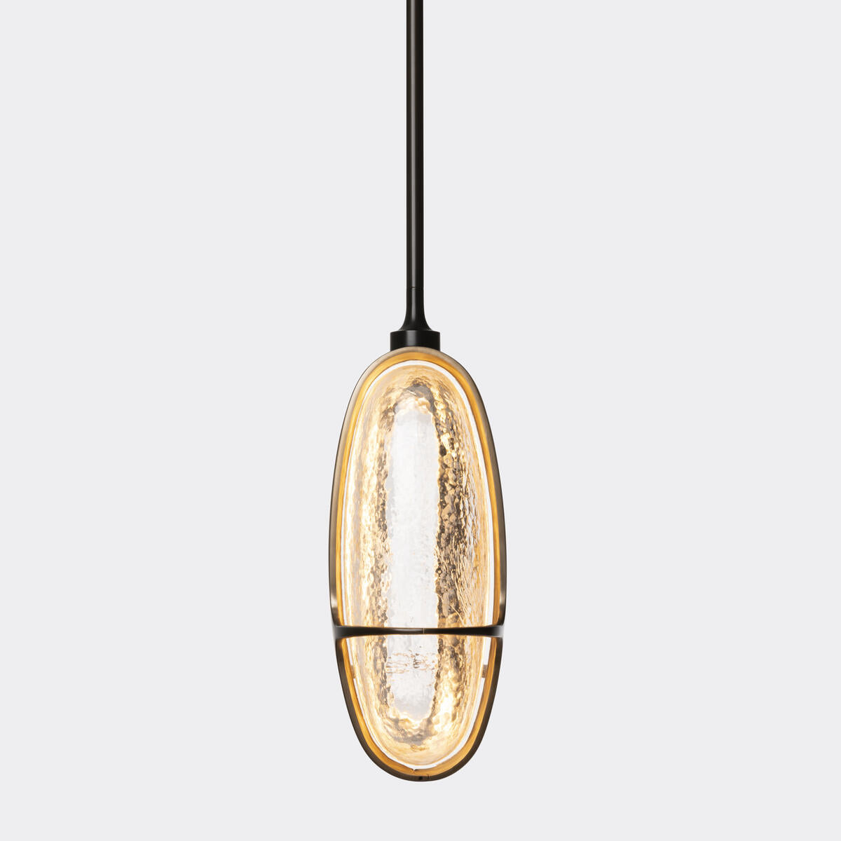 The Iris Pendant Lamp with a clear glass shade, detail shot.