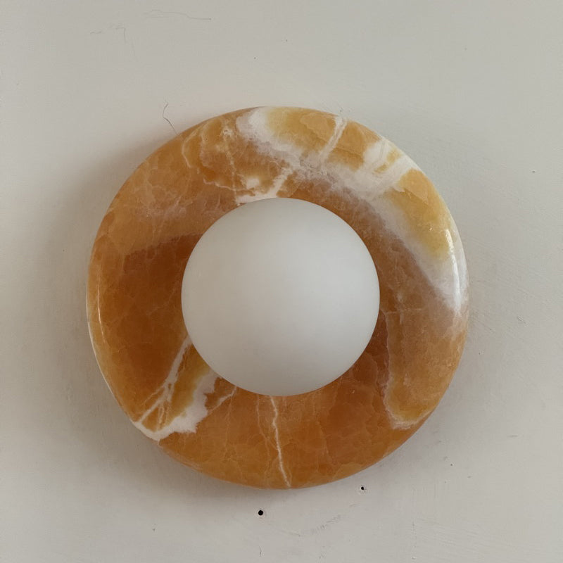 The unique pattern and color variations of the yellow onyx.