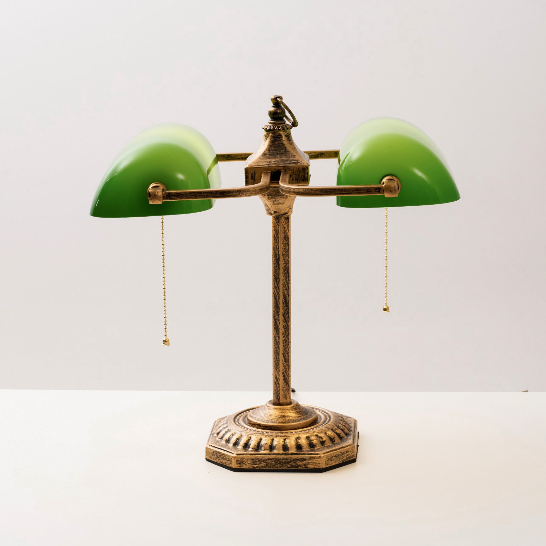 Detail of the joint connecting the lamp arms to the base.