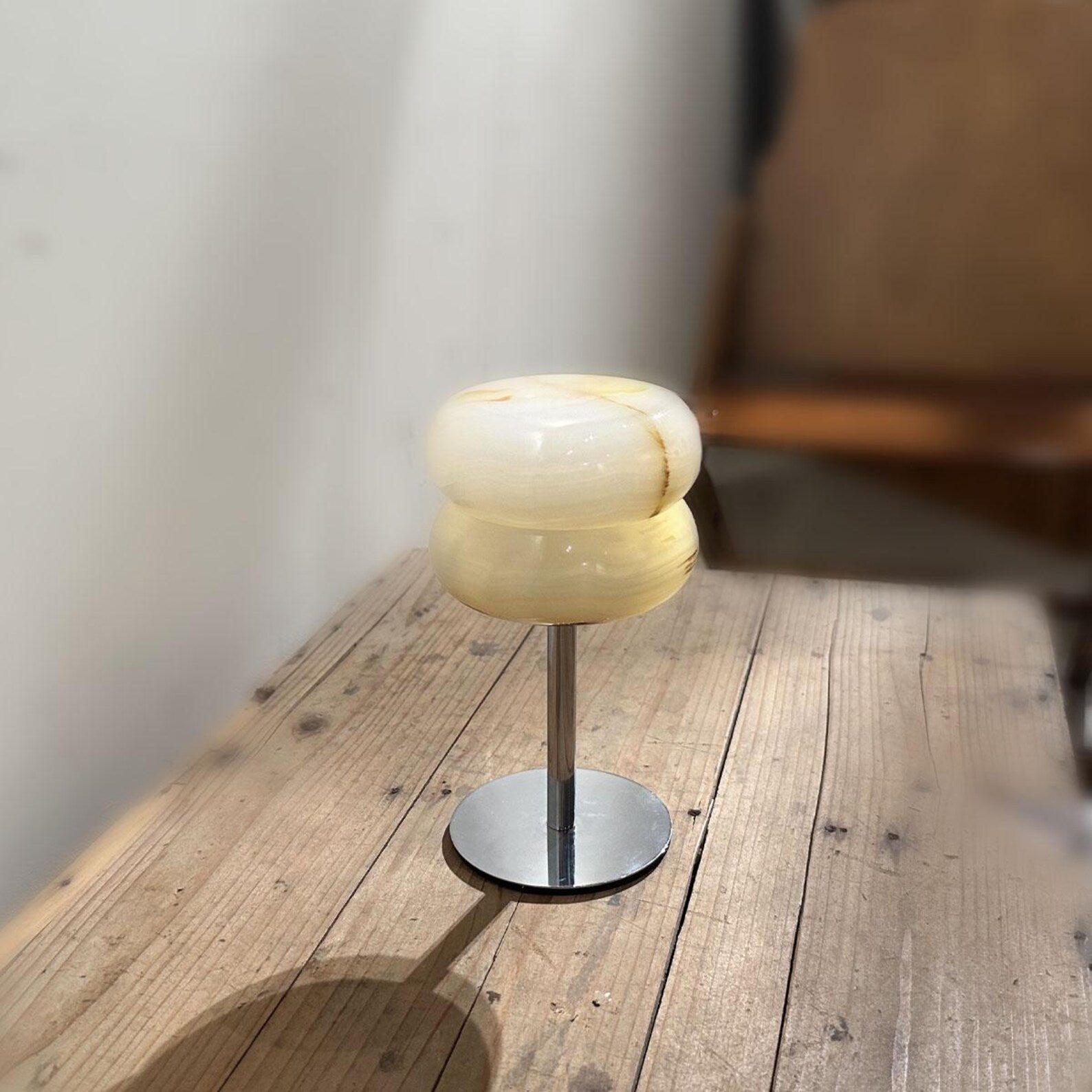 White finish version of the Alabaster Donut Table Lamp.