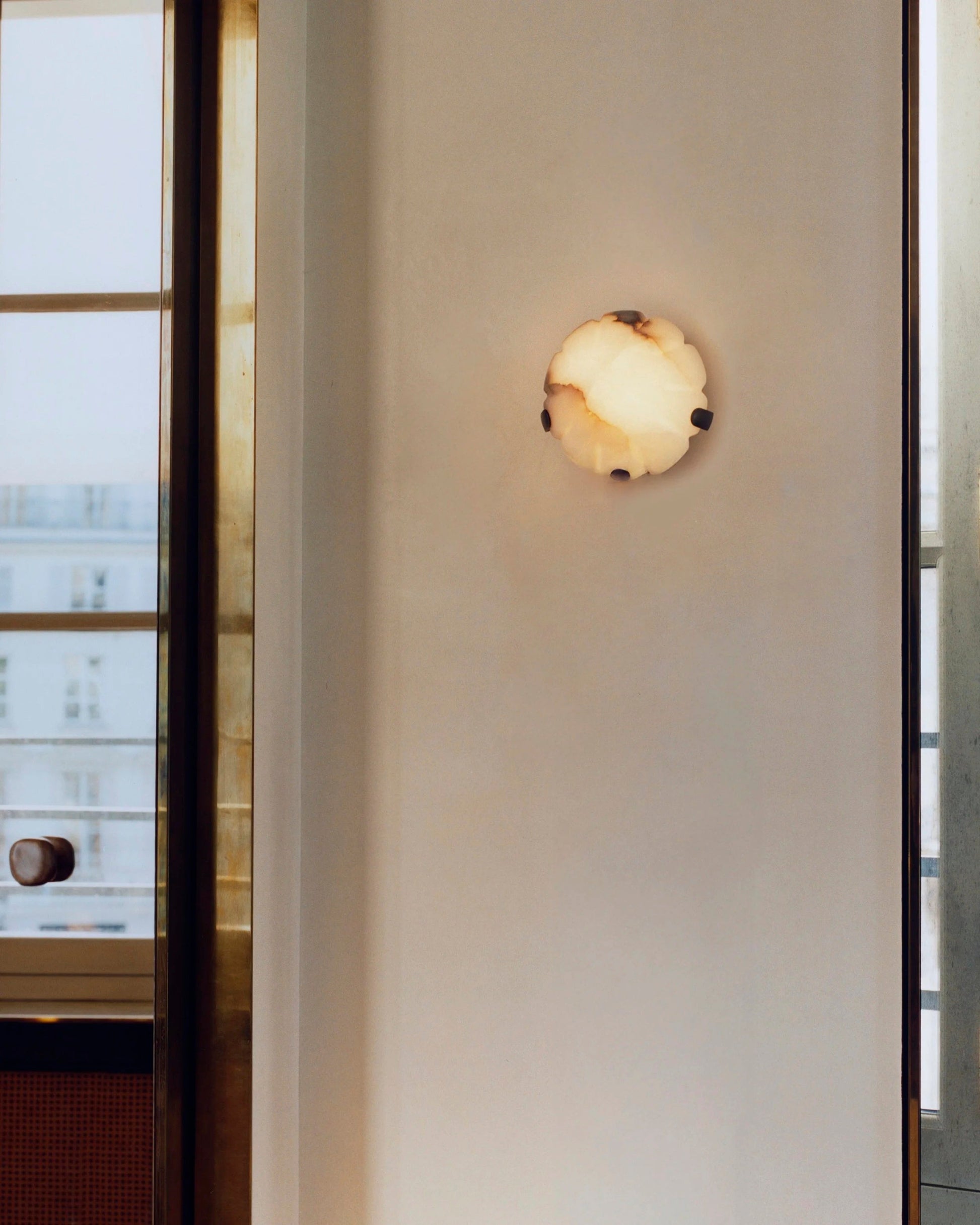 Lifestyle image showing the lamp's scale in a sophisticated living area.