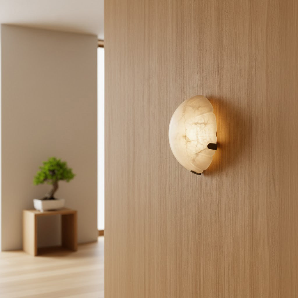 Close-up of the Jellyfish Alabaster Wall Lamp showing natural stone veining.