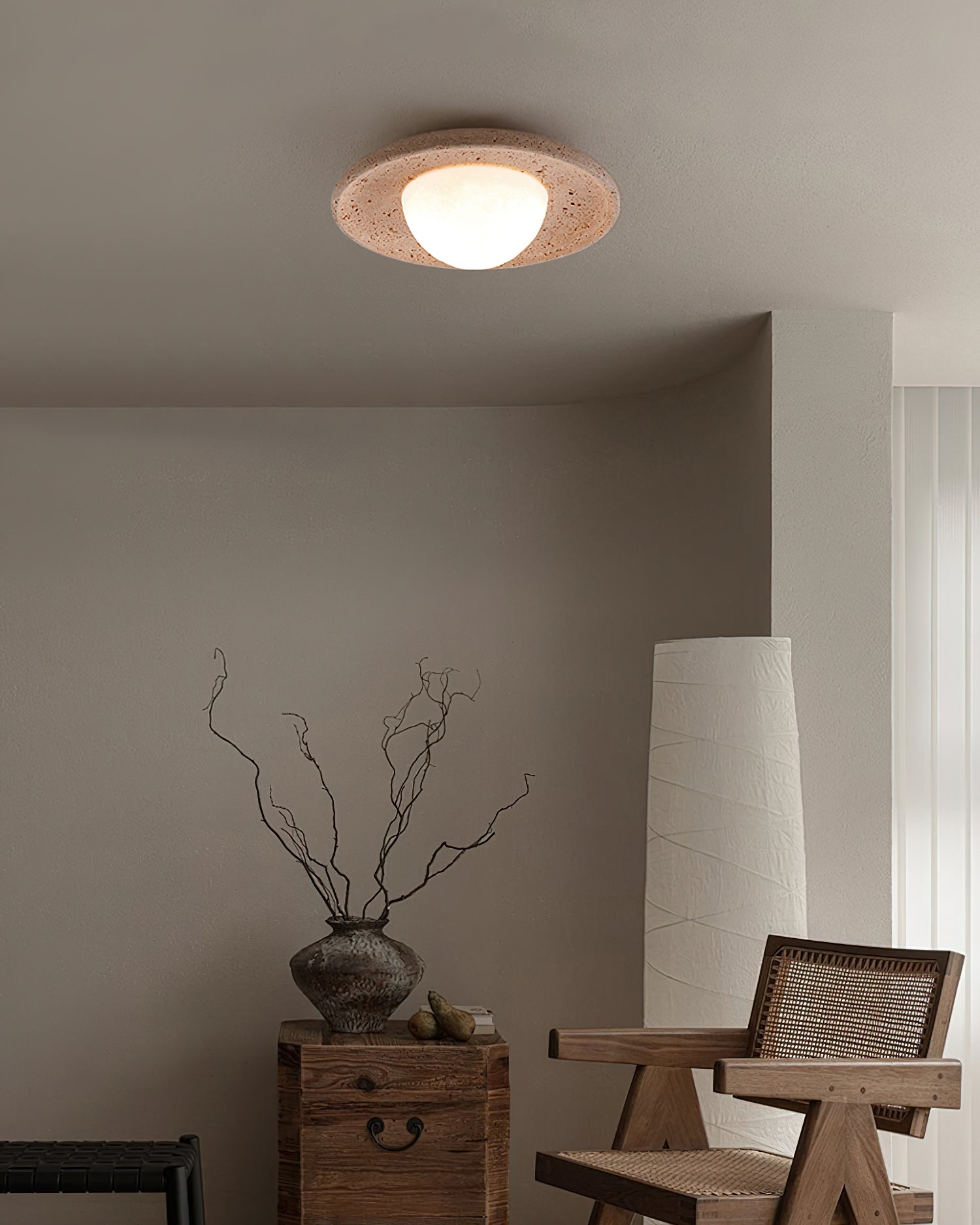 Detailed shot of the travertine material and smooth finish.