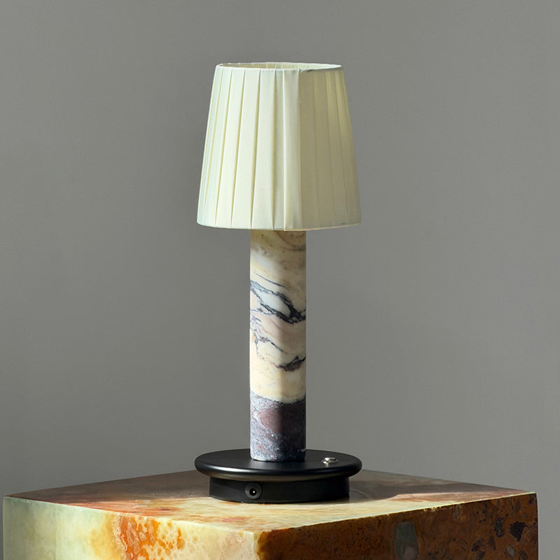 The beige Jorgen Table Lamp against a light, neutral background.
