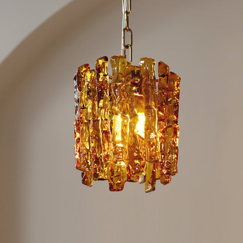 Lifestyle image of the Kalmar Pendant Light in a high-ceiling entryway.