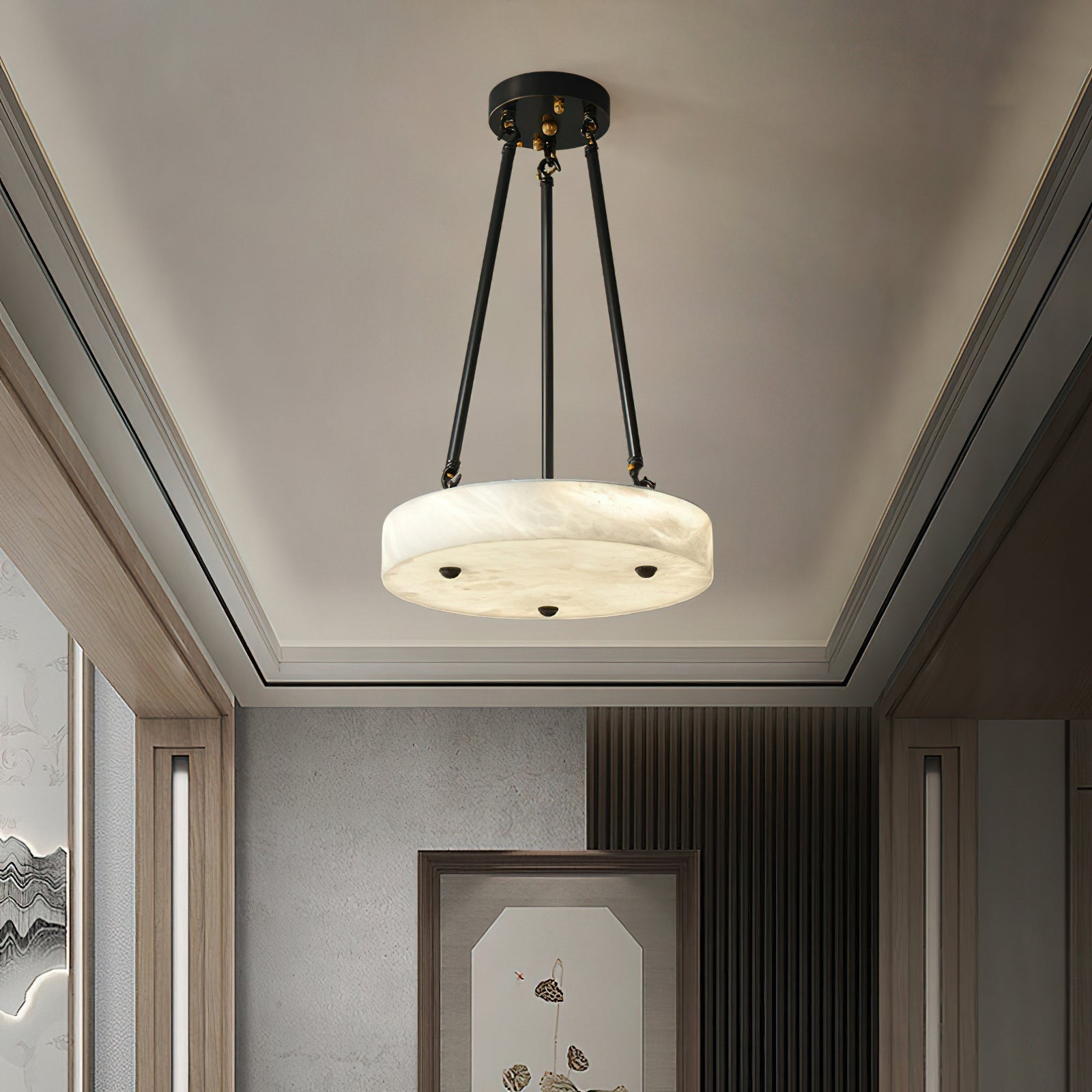Kayme Alabaster Pendant Lamp illuminated, showing its warm, ethereal glow.