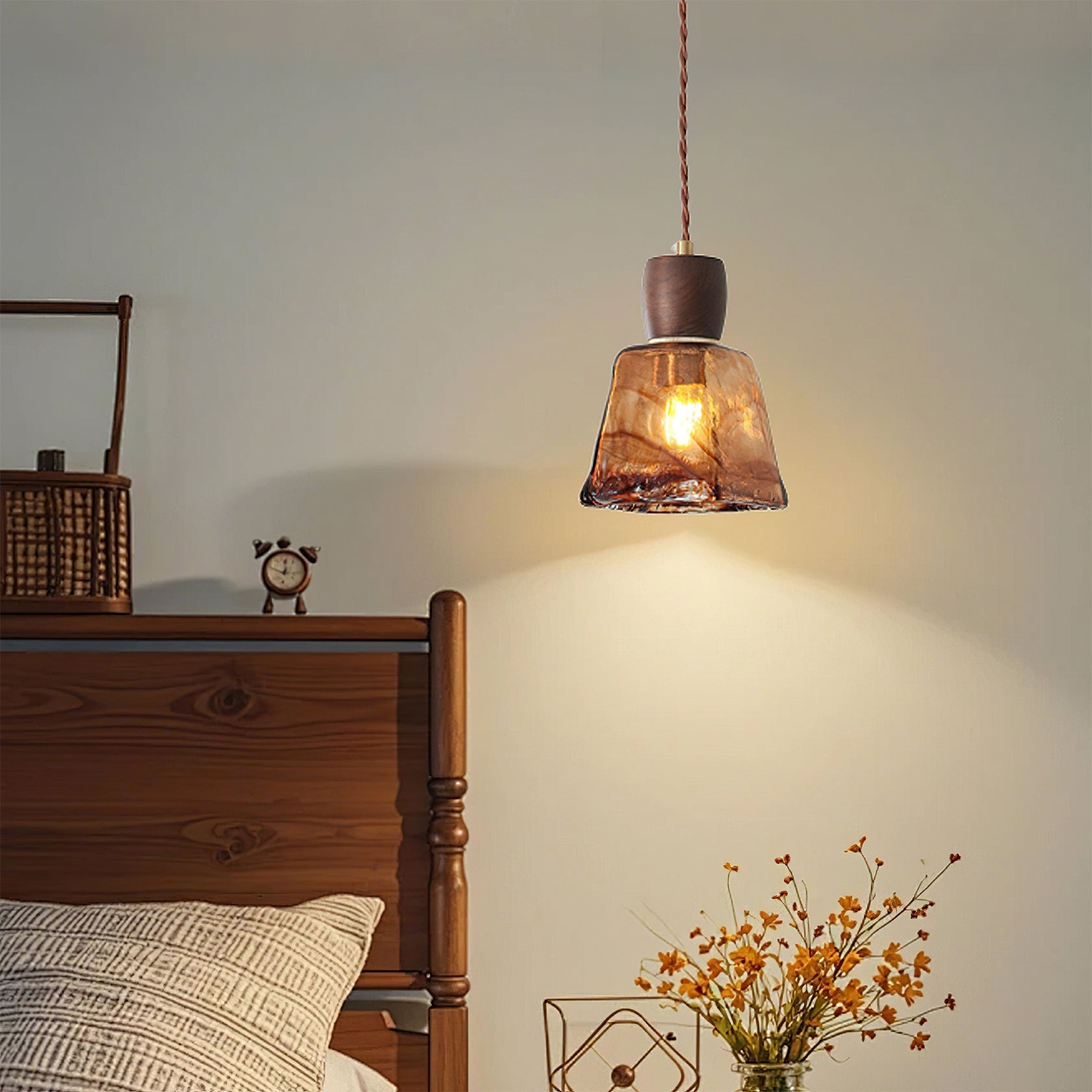 Keju Pendant Light hanging over a kitchen island.