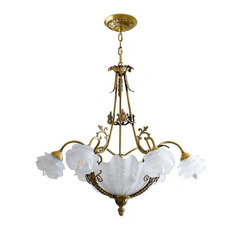 Lifestyle image of the chandelier providing ambient light over a dining table.