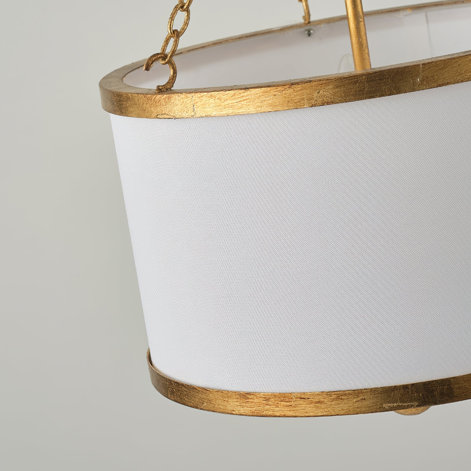 Lifestyle image of the Kian Pendant Light in a transitional style bedroom.