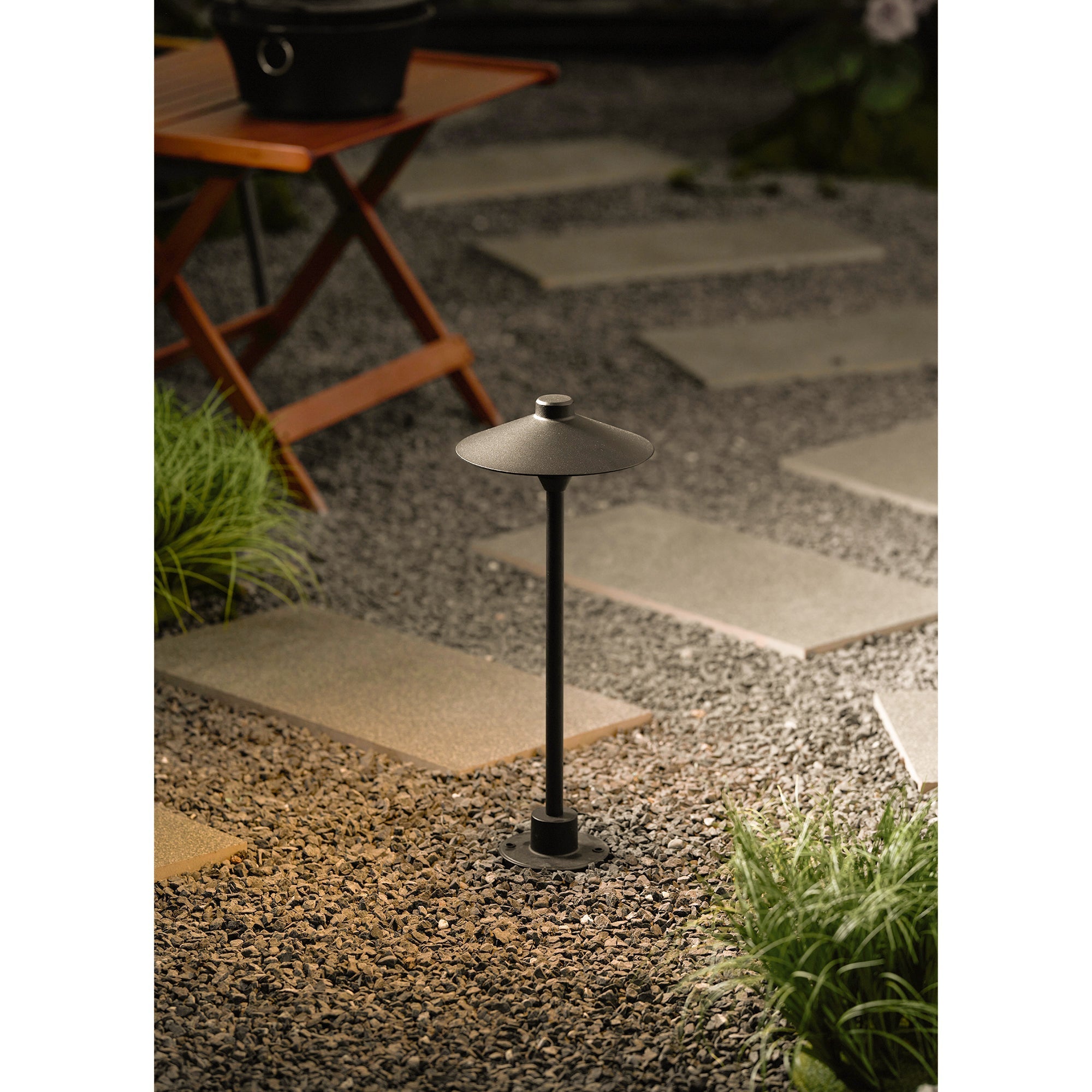 Lifestyle image of the lamp on a balcony.