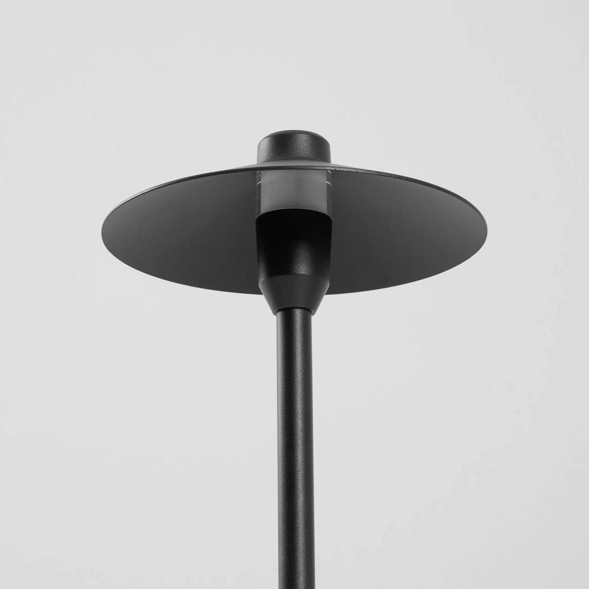 The lamp's sturdy base ensuring stability.