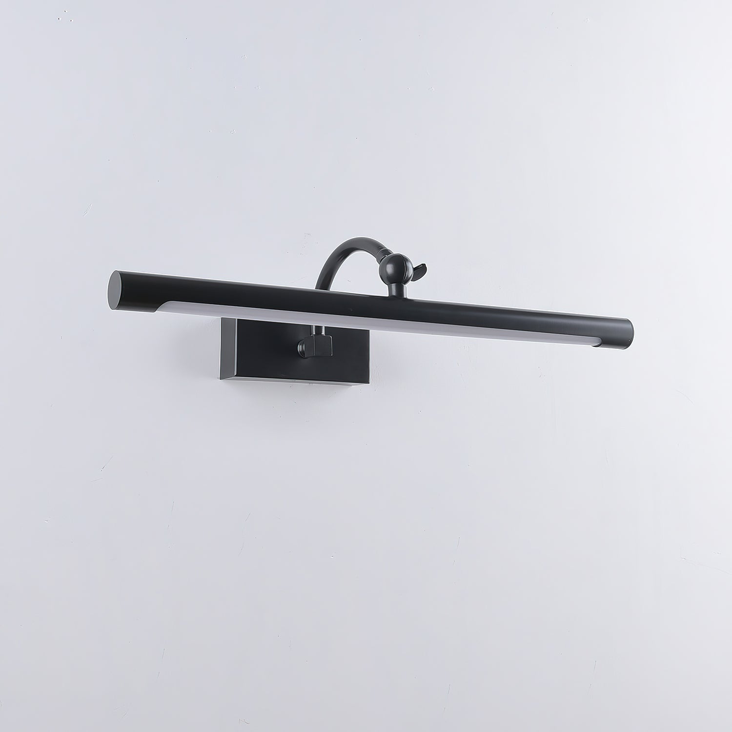 The Kingsbury sconce used as a picture light above framed artwork.