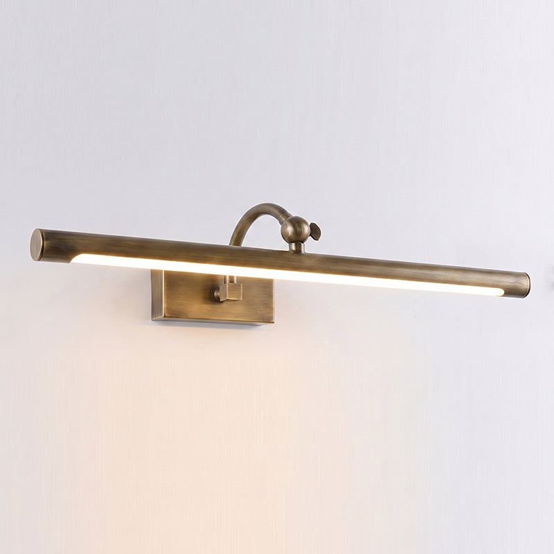 The medium 22.4-inch Kingsbury sconce illuminating a gallery wall.