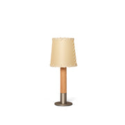 Kove Parchment Table Lamp with a wood stem and beige conical shade.