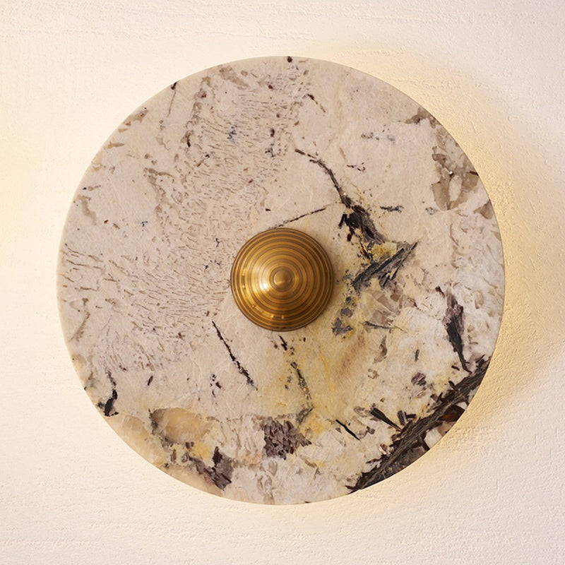 Rectangular white marble wall lamp on a grey wall.