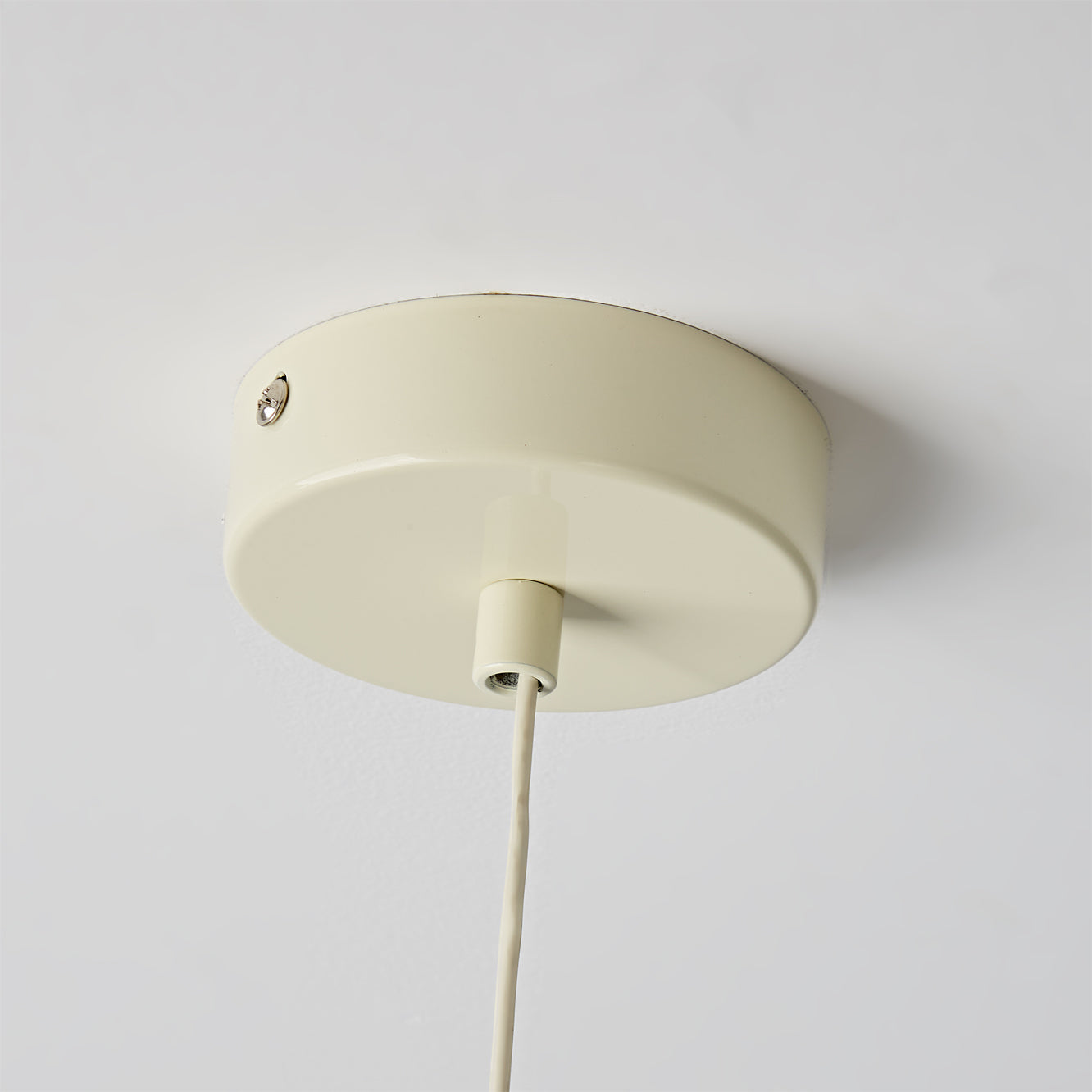 The Laguna Pendant Light in a bedroom setting.