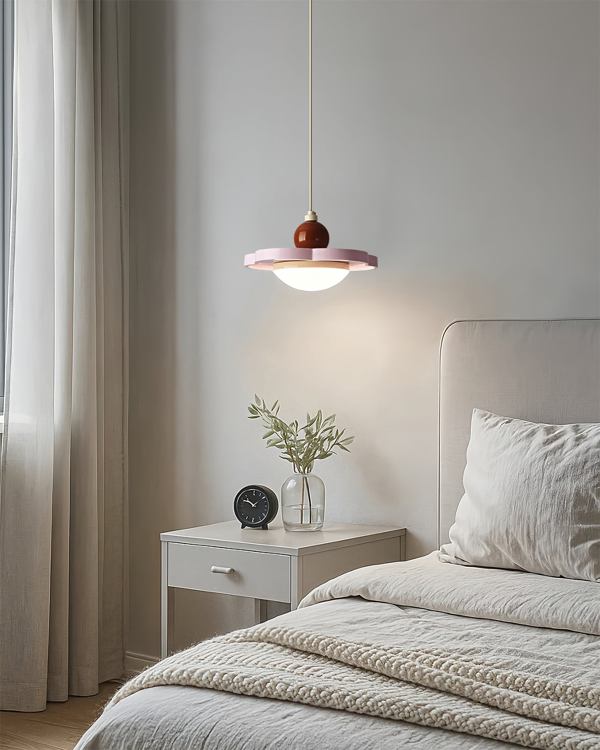 The Laguna Pendant Light shown illuminated, casting a warm glow.