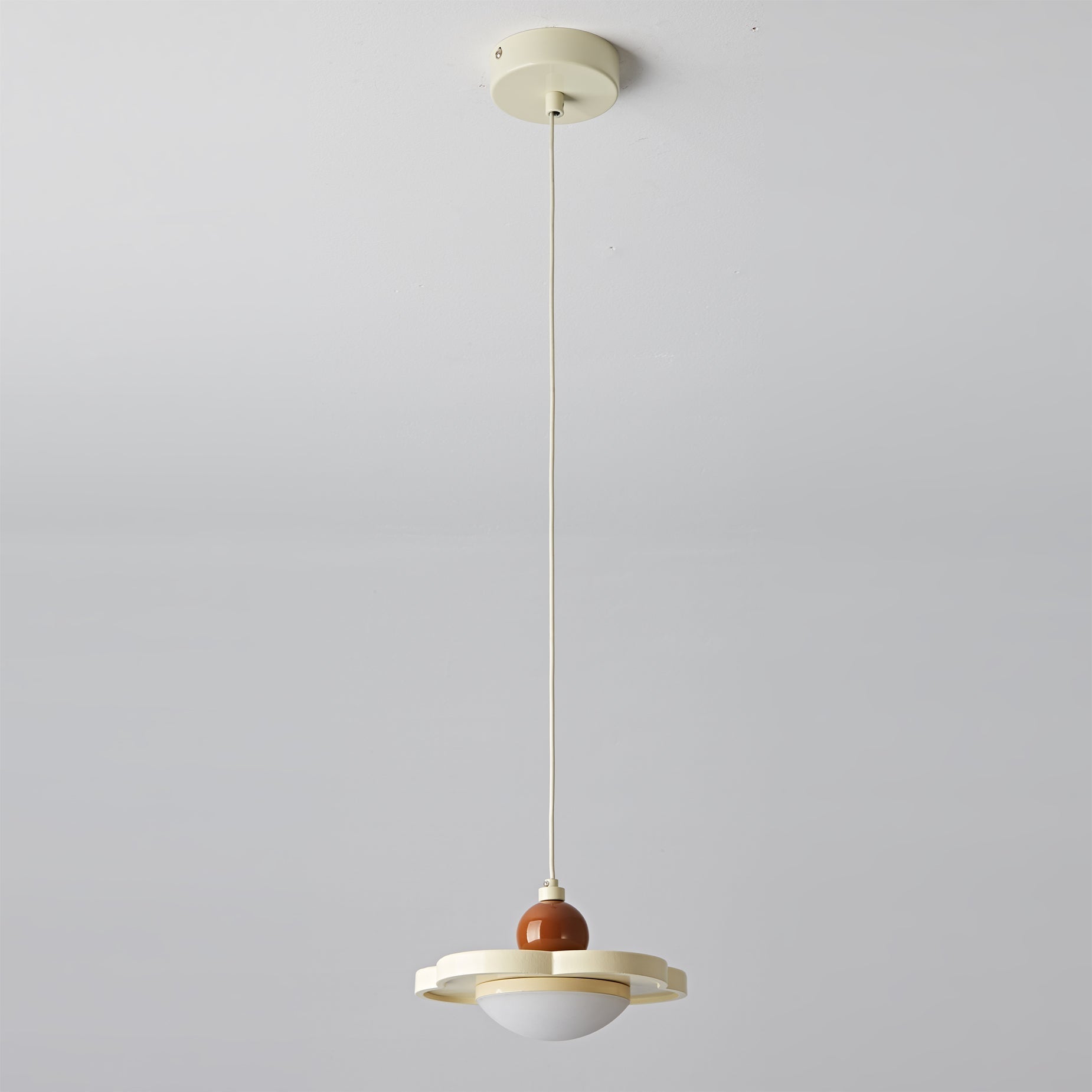 Laguna Pendant Light hanging in a contemporary living room.
