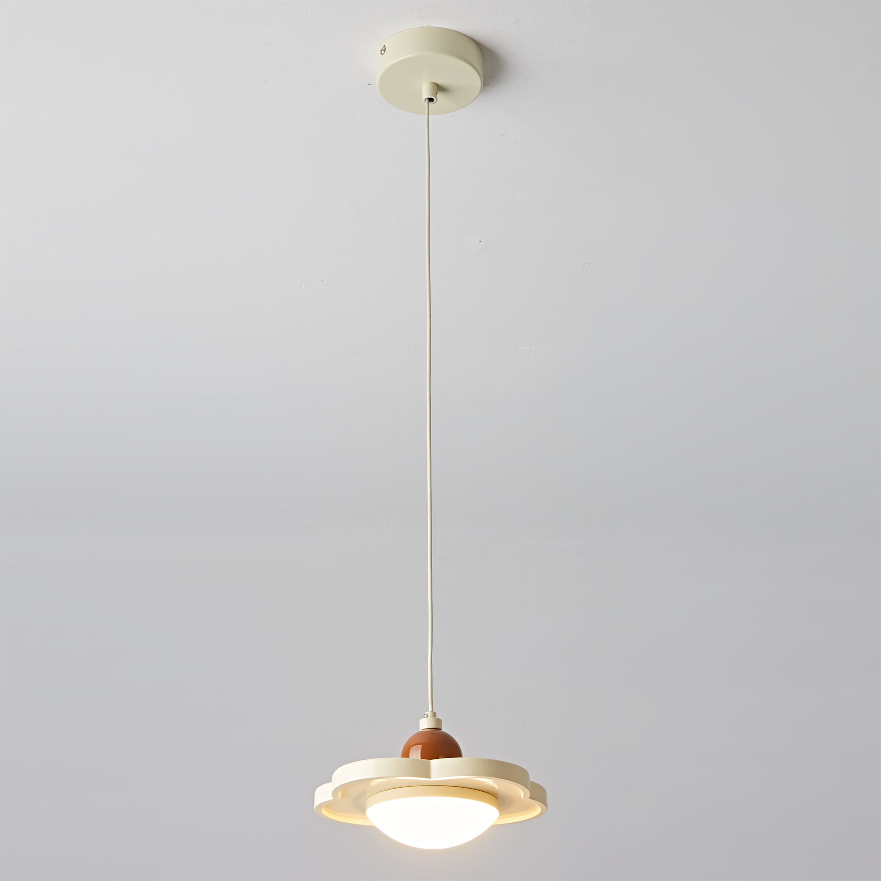 Laguna Pendant Light in cream finish, angled view.
