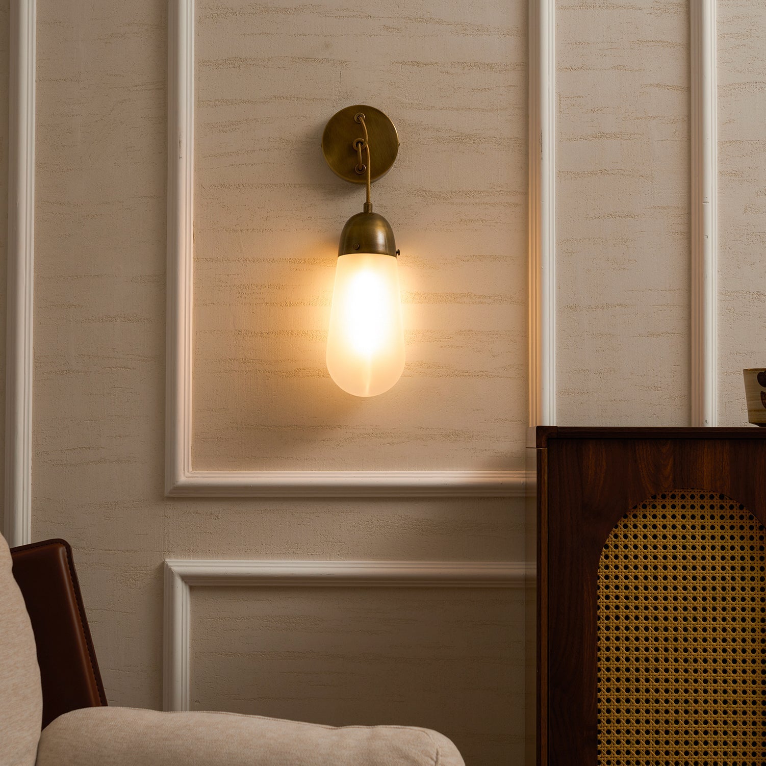 The warm glow from the Lariat Wall Lamp's E27 bulb.
