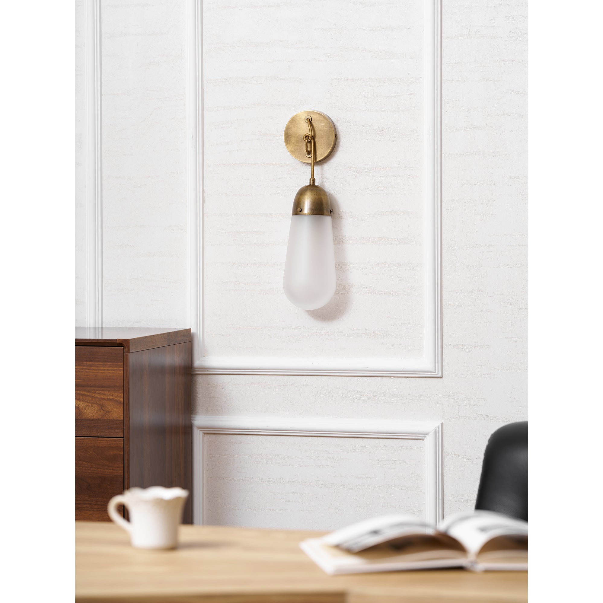 Lariat Wall Lamp in black finish, close-up on texture.