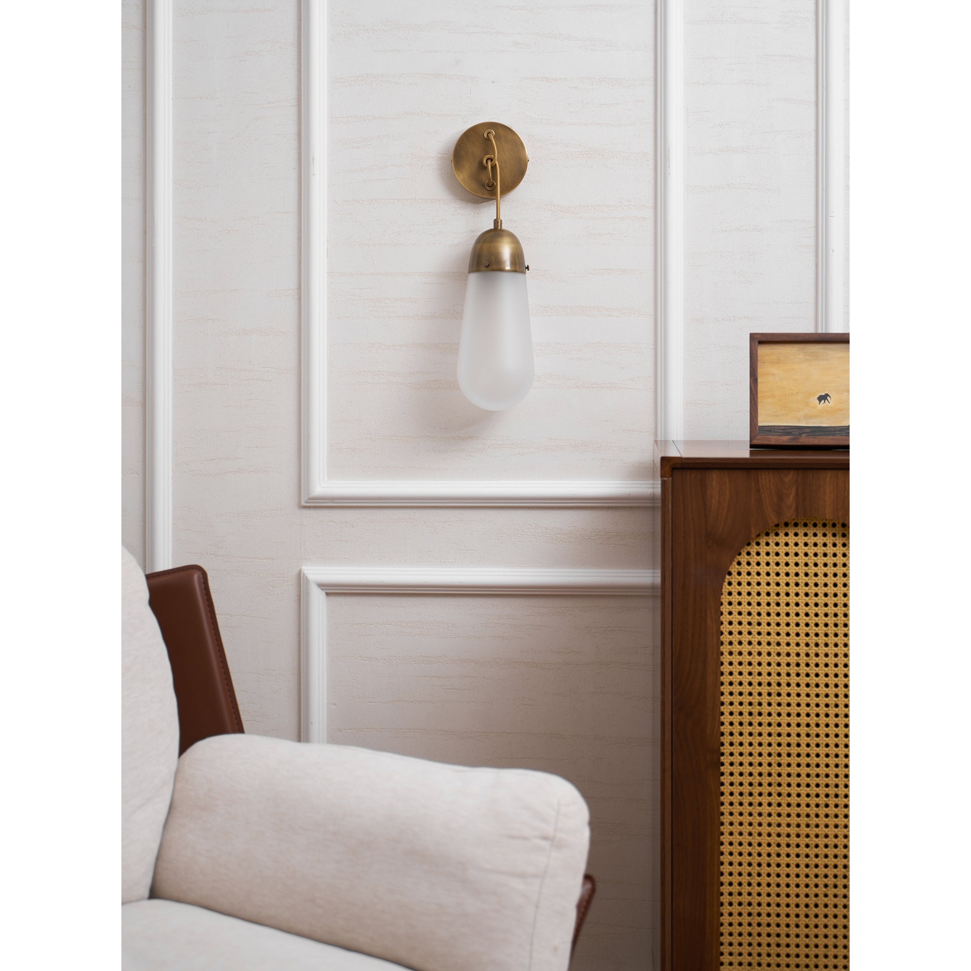 Unlit Lariat Wall Lamp in bronze, showcasing its form.