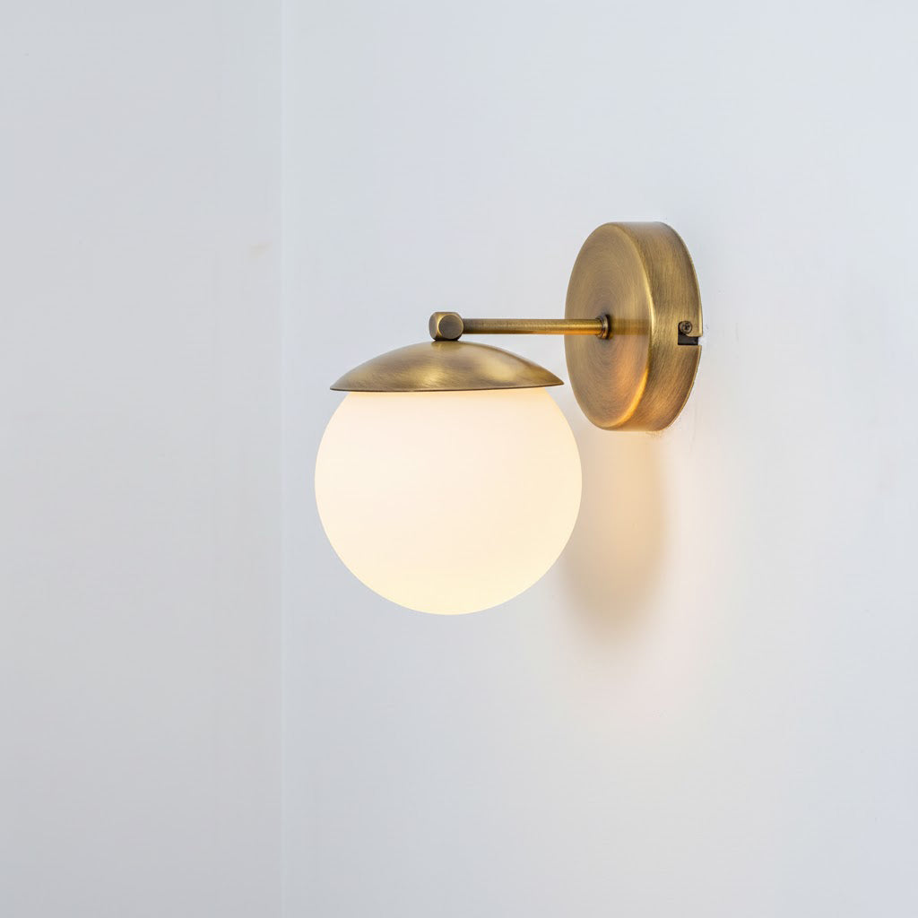 The Julep wall lamp with a white finish option.