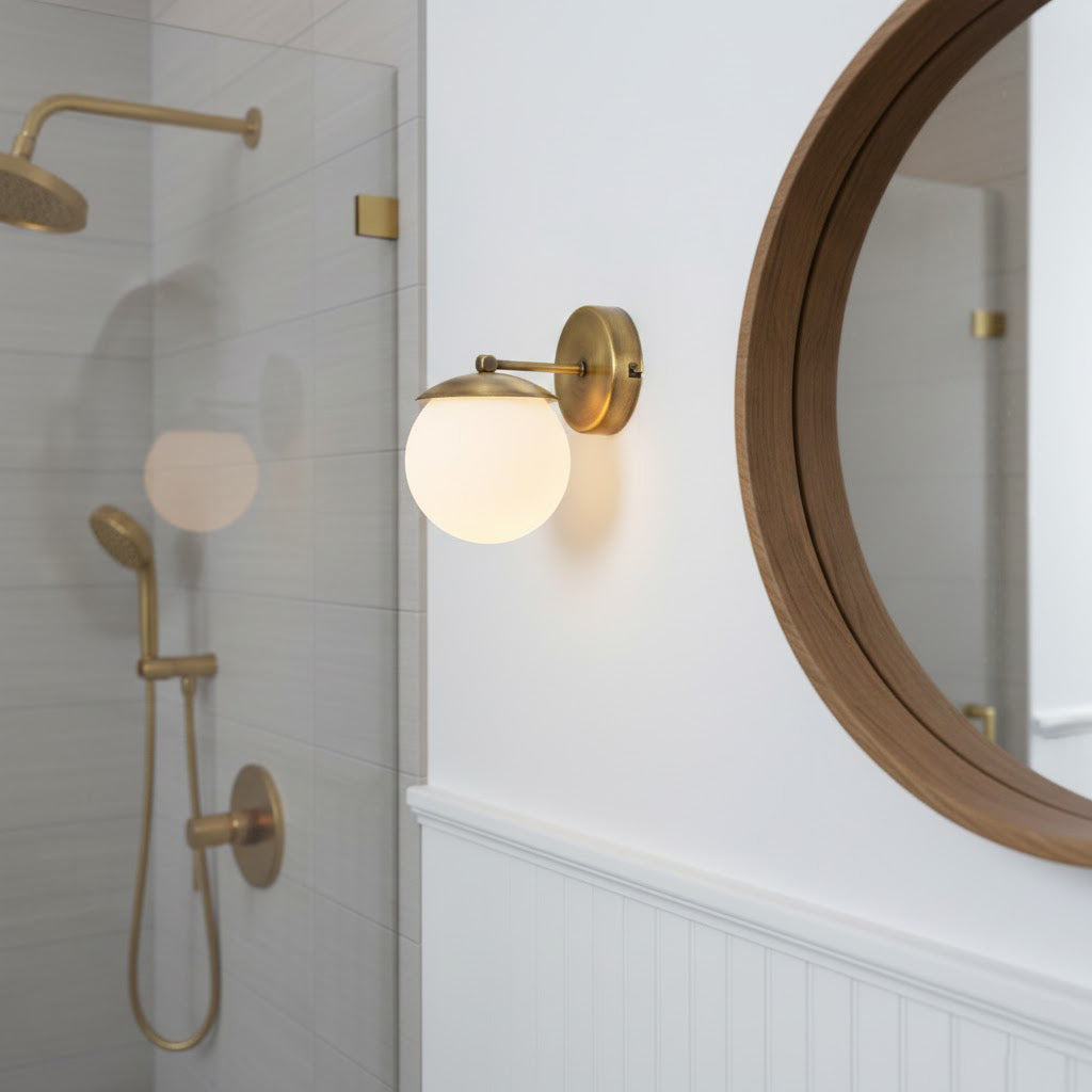 Angled view of the Julep wall sconce against a neutral wall.