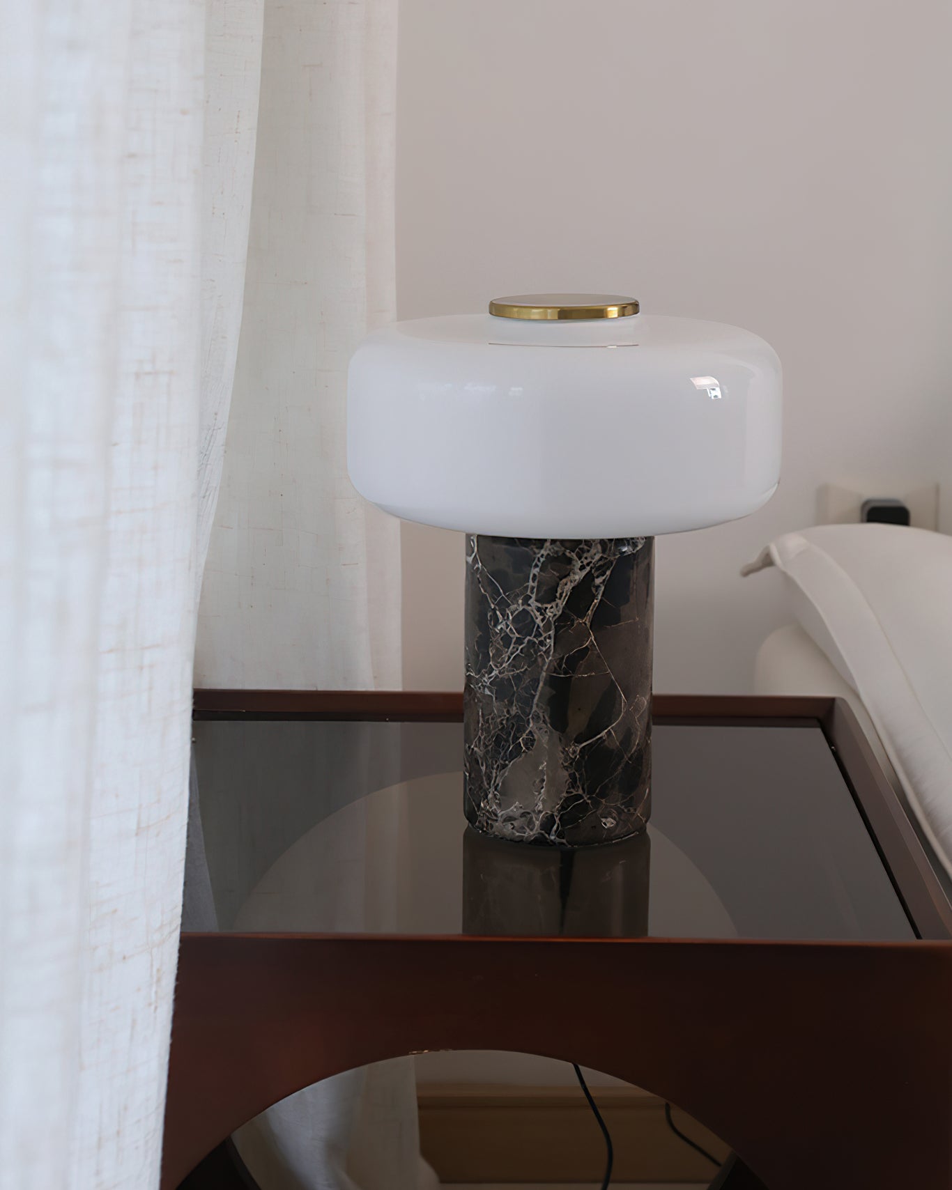 Detailed shot of the translucent mushroom-shaped glass diffuser shade.