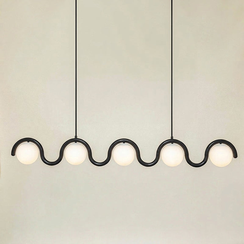 Detail of the curved brass tube on the Lenox lamp.