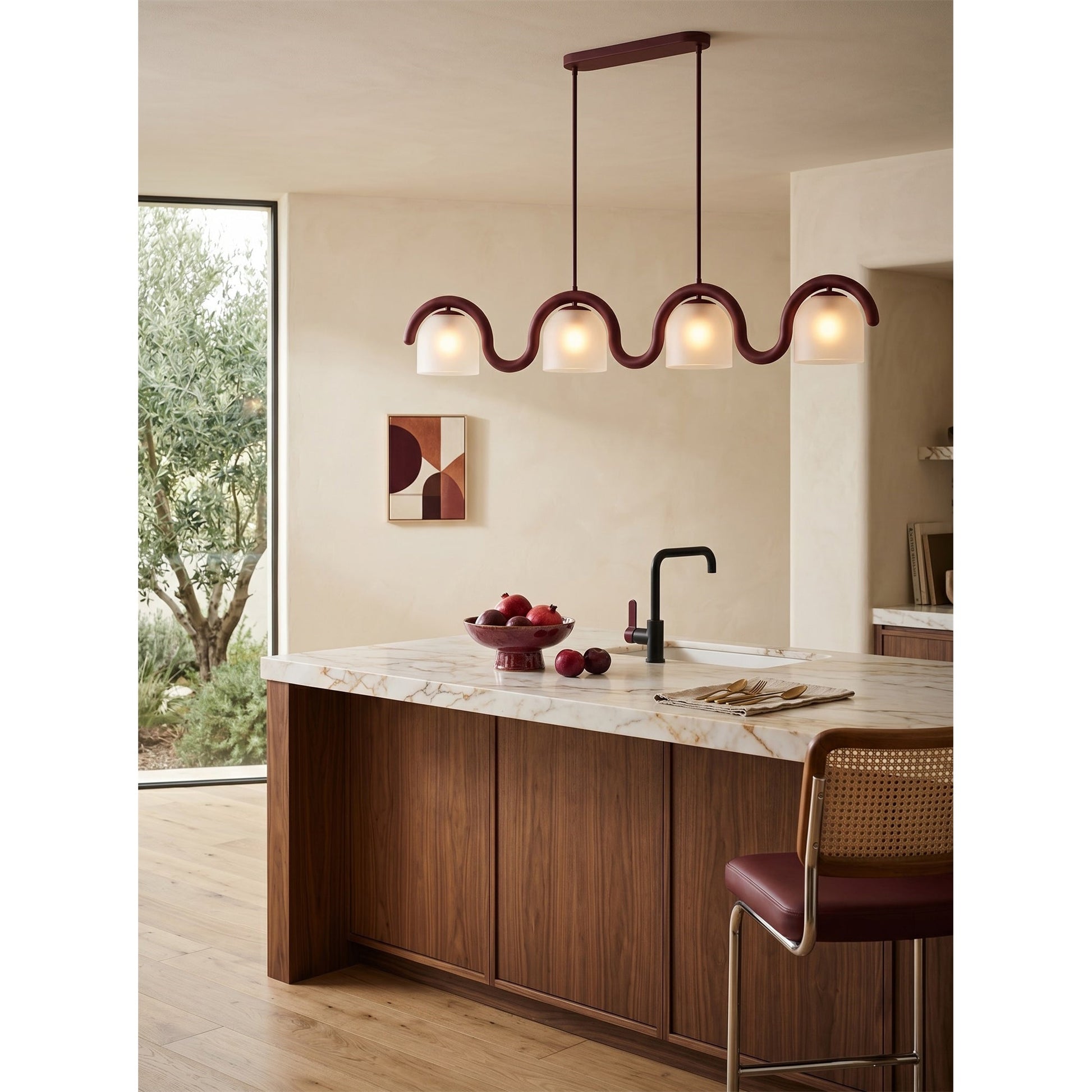 Lifestyle image of the chandelier in a chic, open-concept living space.