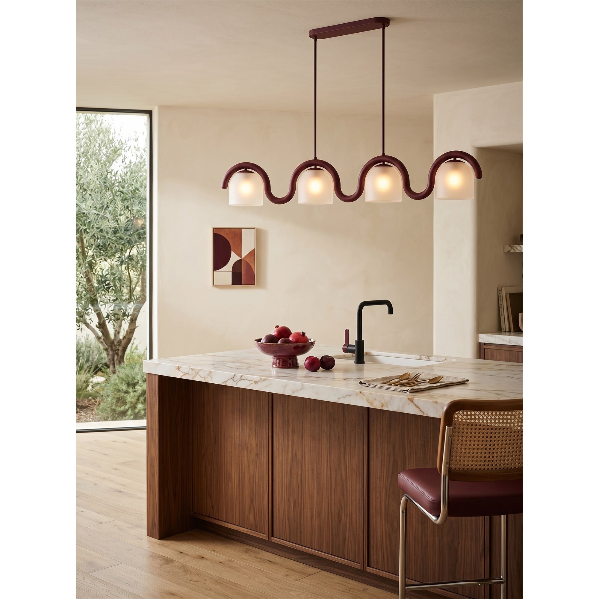 Lifestyle image of the chandelier in a chic, open-concept living space.