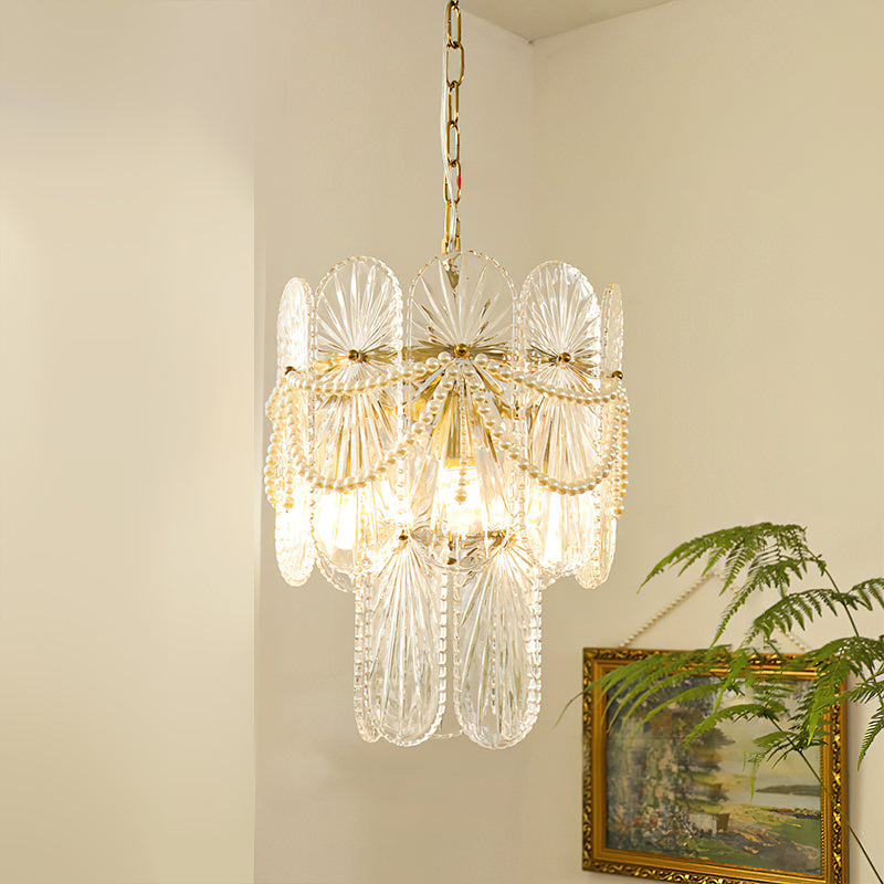 The 9-light version of the Leon Chandelier, showcasing its wider diameter.